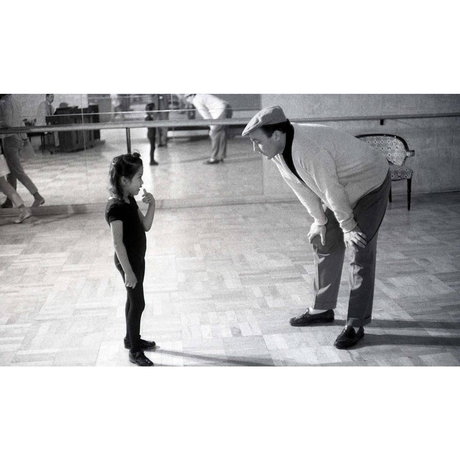 Unknown Black and White Photograph - Gene Kelly teaching dance