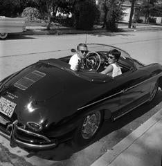 Steve McQueen and Neile Adams in his Porsche