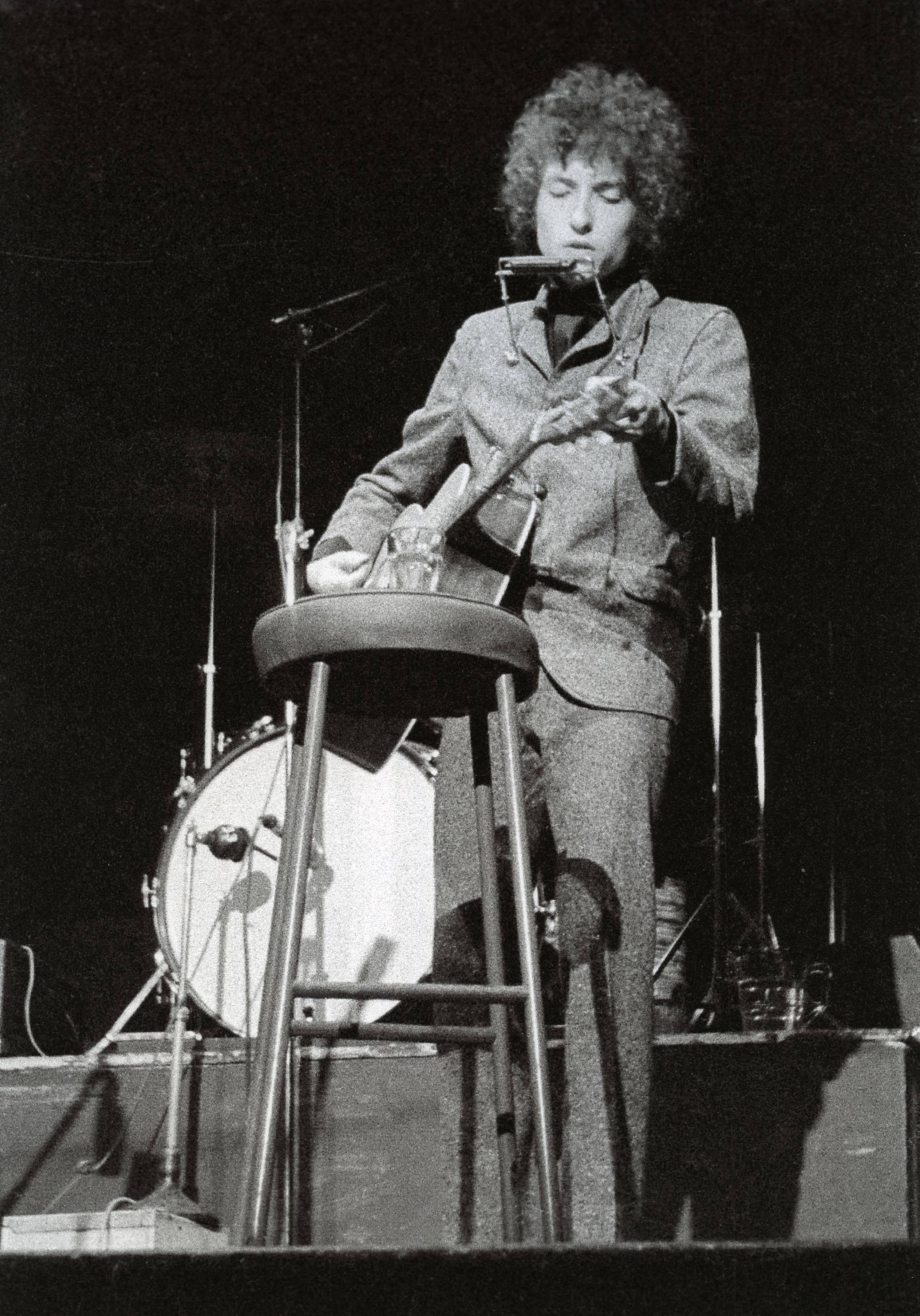 Unknown Portrait Photograph - Bob Dylan Performing on Stage with His Hamonica, Vintage Original Photograph