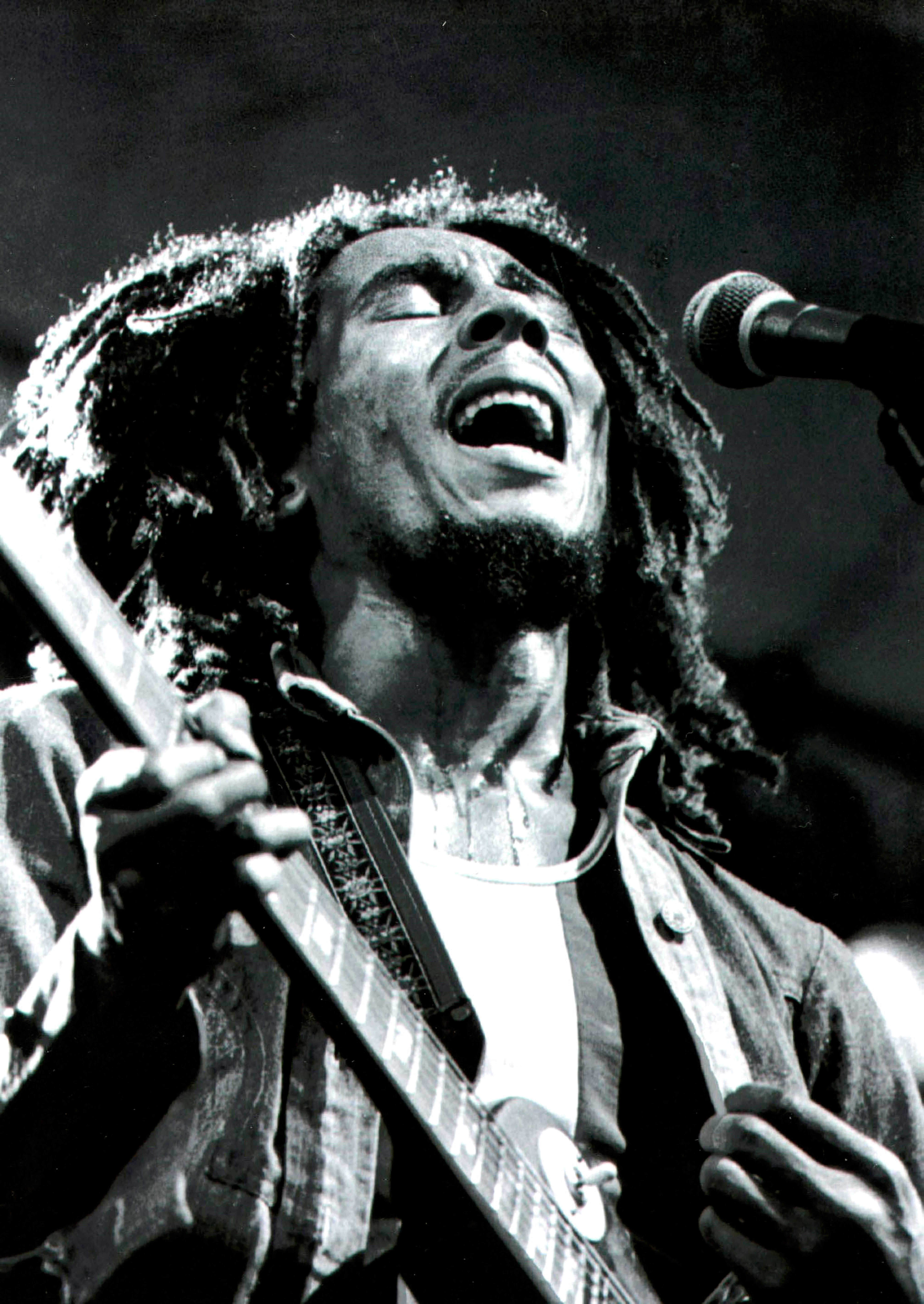 Unknown Black and White Photograph - Bob Marley Singing Into Microphone Fine Art Print