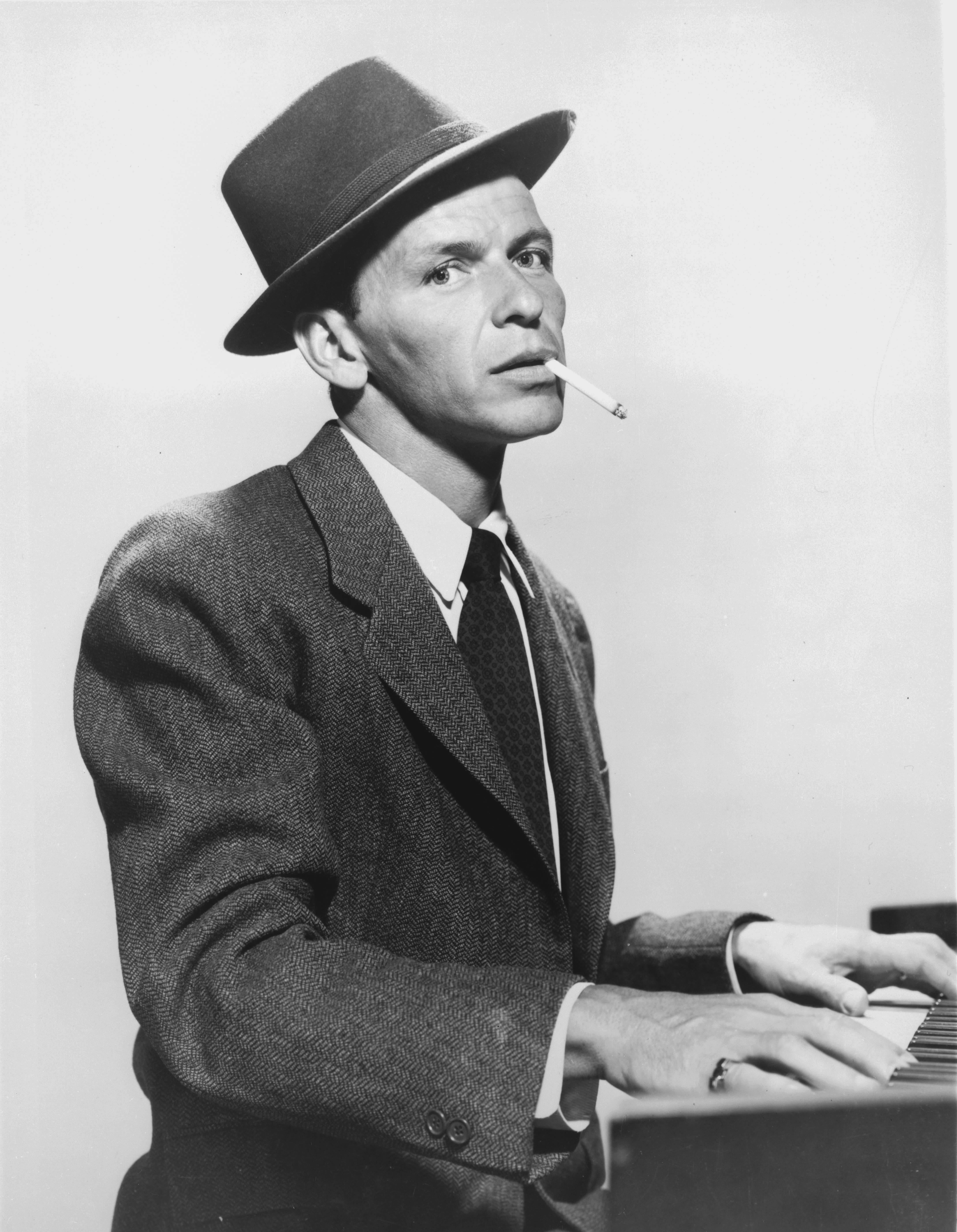Unknown Portrait Photograph - Frank Sinatra Playing Piano and Smoking a Cigarette Fine Art Print