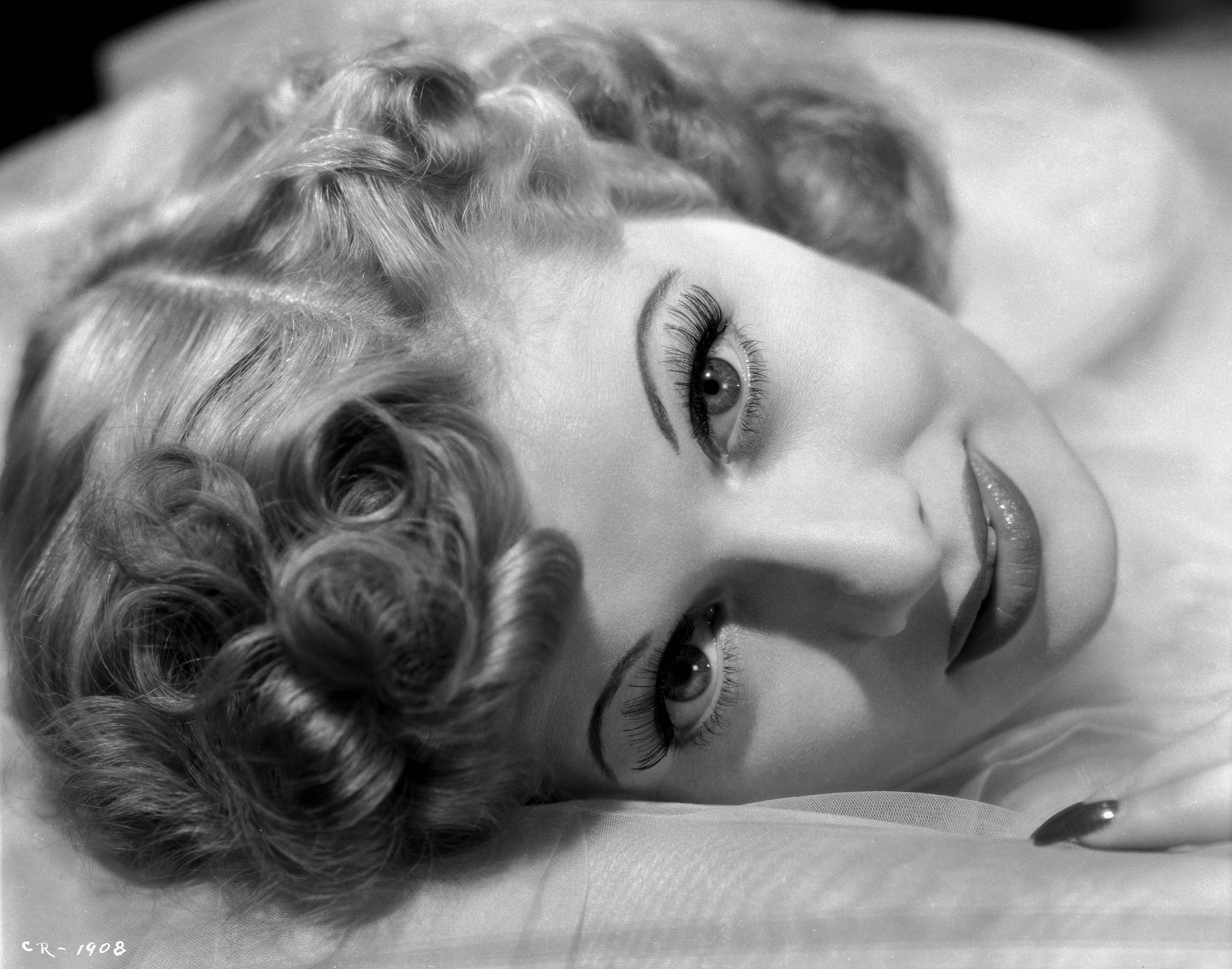 Ernest Bachrach Black and White Photograph - Lucille Ball Lying in Fur Fine Art Print