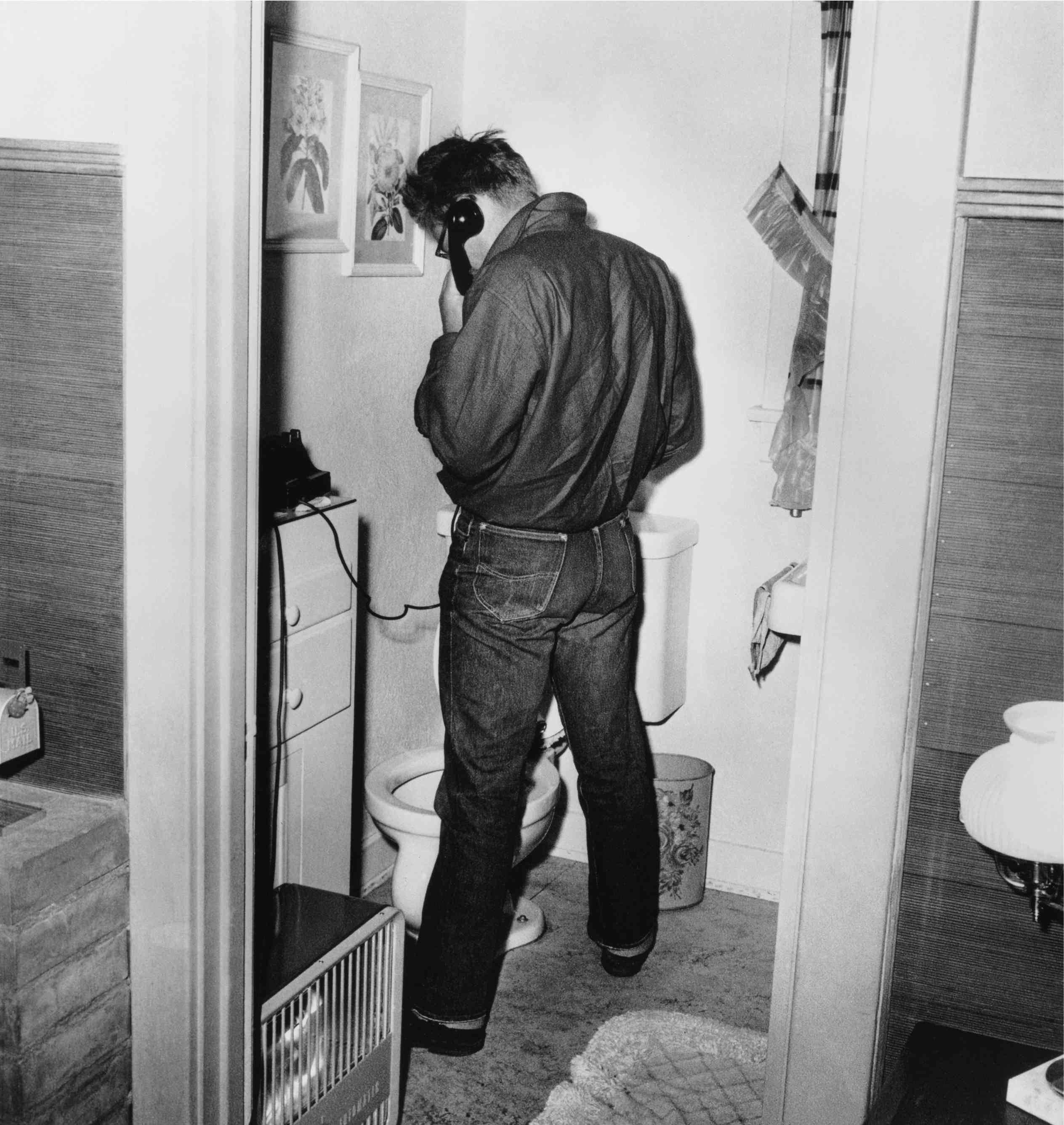 Frank Worth Black and White Photograph - James Dean in Restroom Fine Art Print