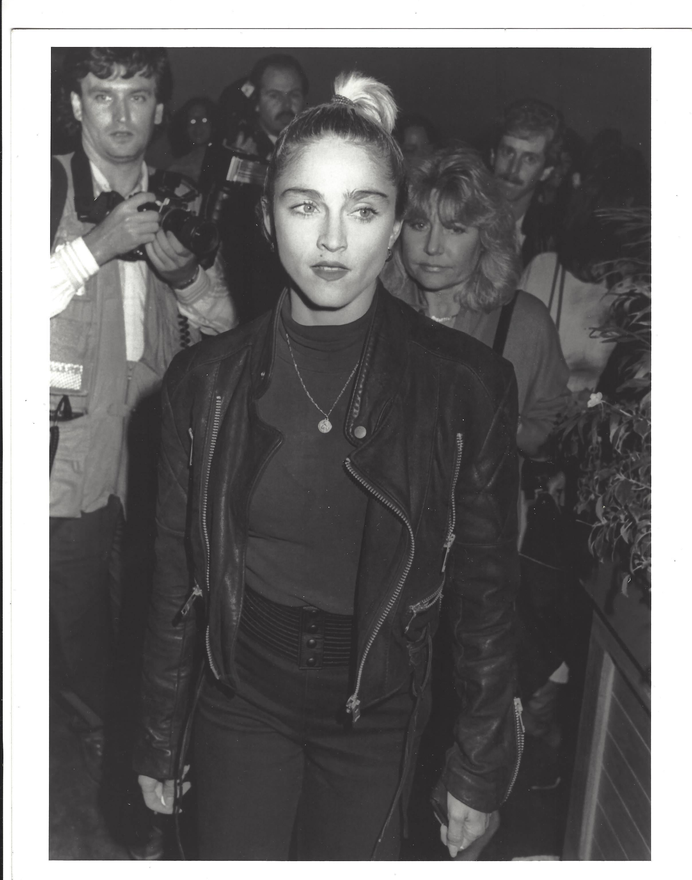 Greg De Guire Black and White Photograph - Candid Madonna Walking Vintage Original Photograph