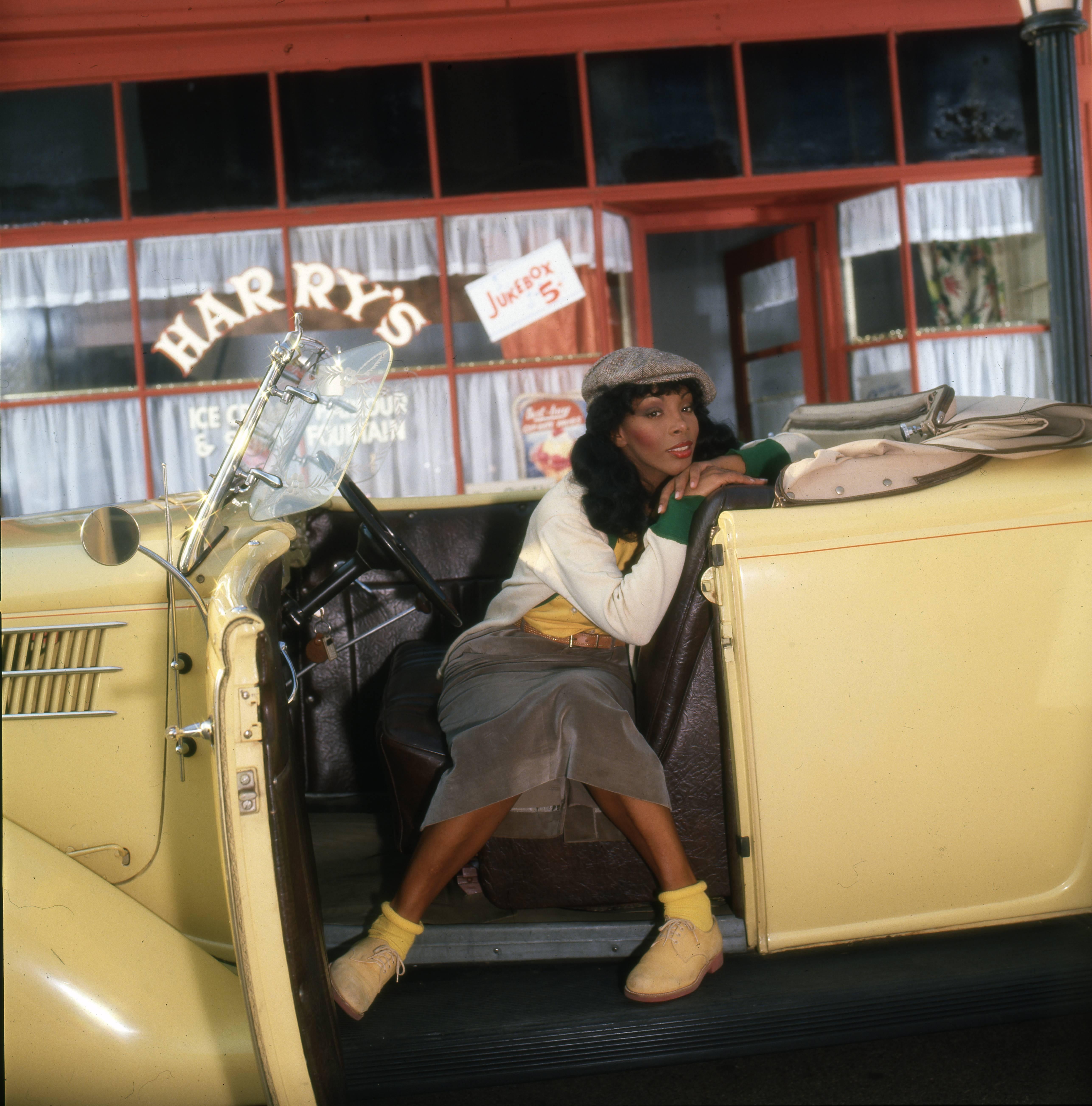 Harry Langdon Color Photograph - Donna Summer Leaning in Car - I Fine Art Print