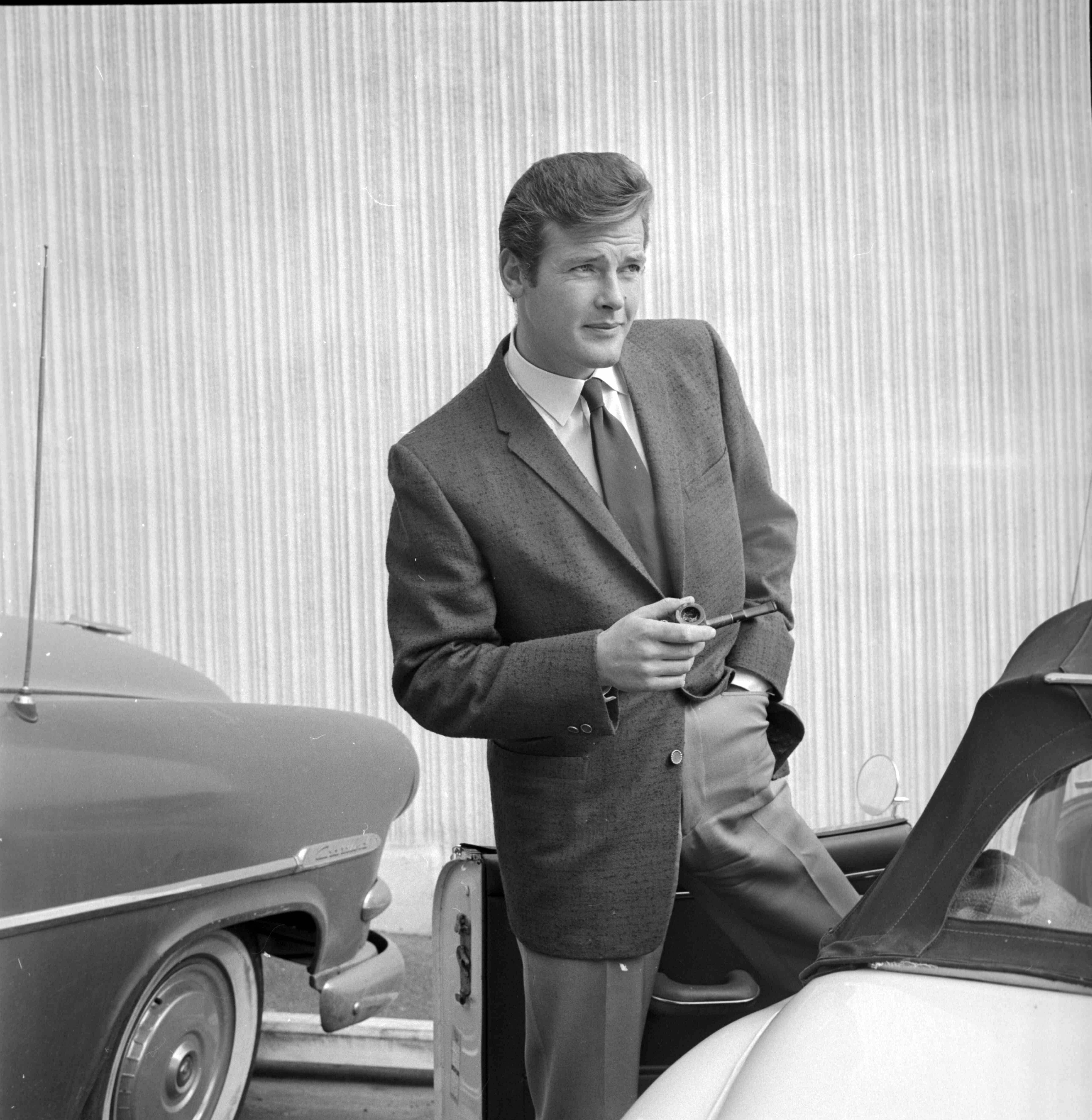 Larry Barbier Black and White Photograph - Roger Moore in Suit Fine Art Print