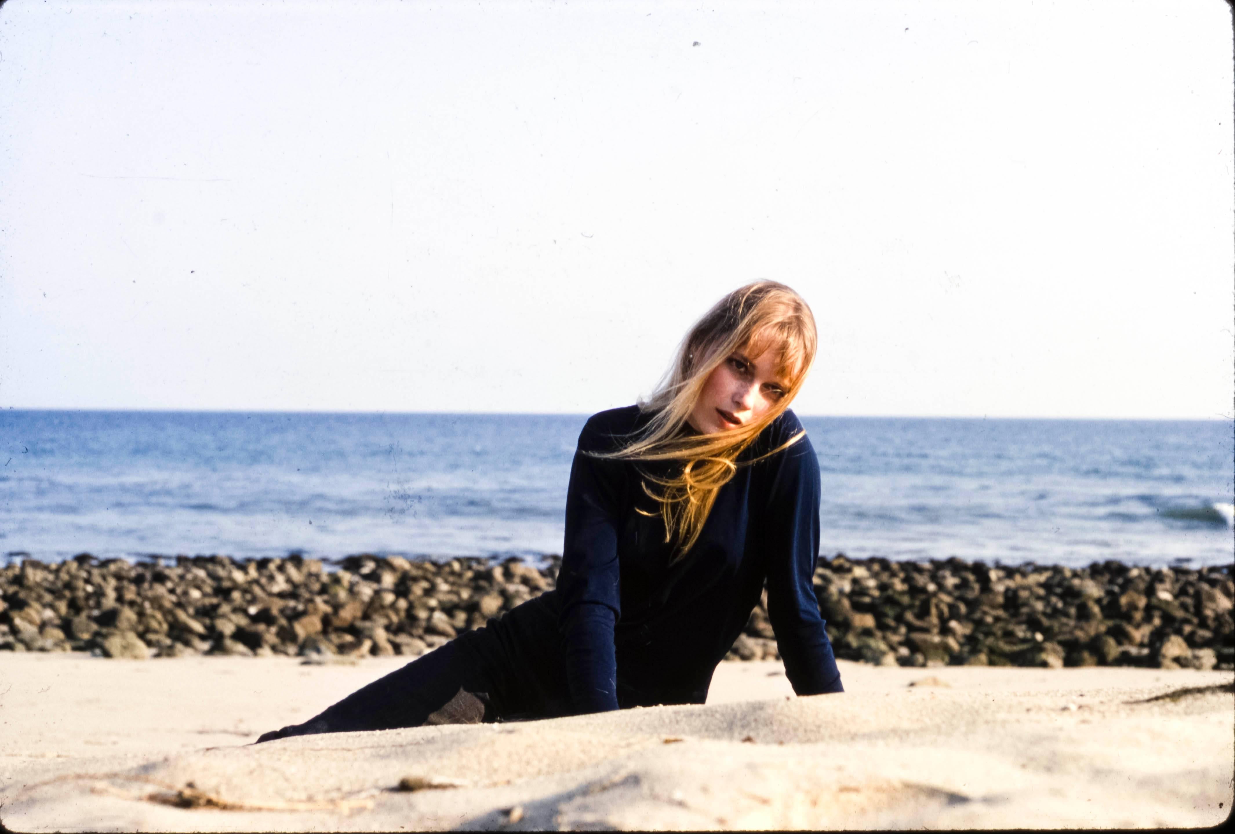 Larry Barbier Color Photograph - Mia Farrow Lying on Beach Fine Art Print