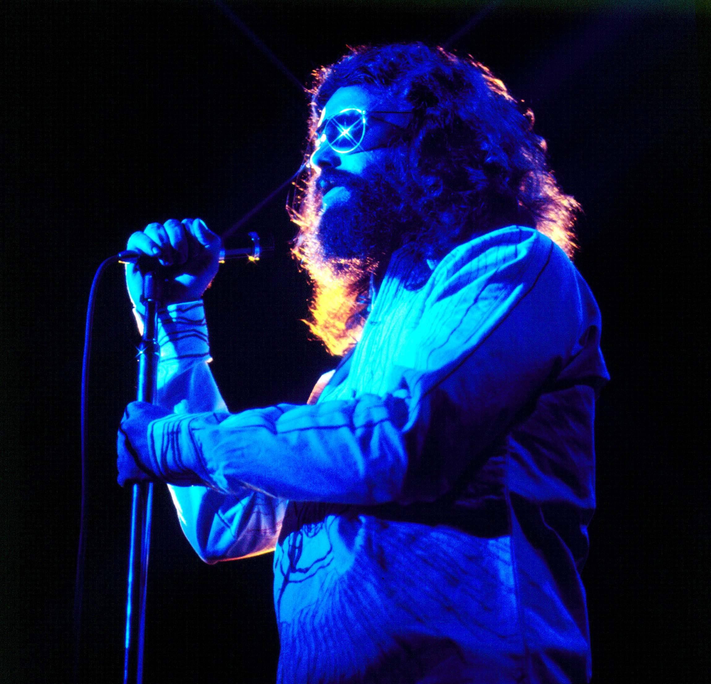 Jay Thompson Color Photograph - Jim Morrison Sunglasses on Stage - Color Fine Art Print
