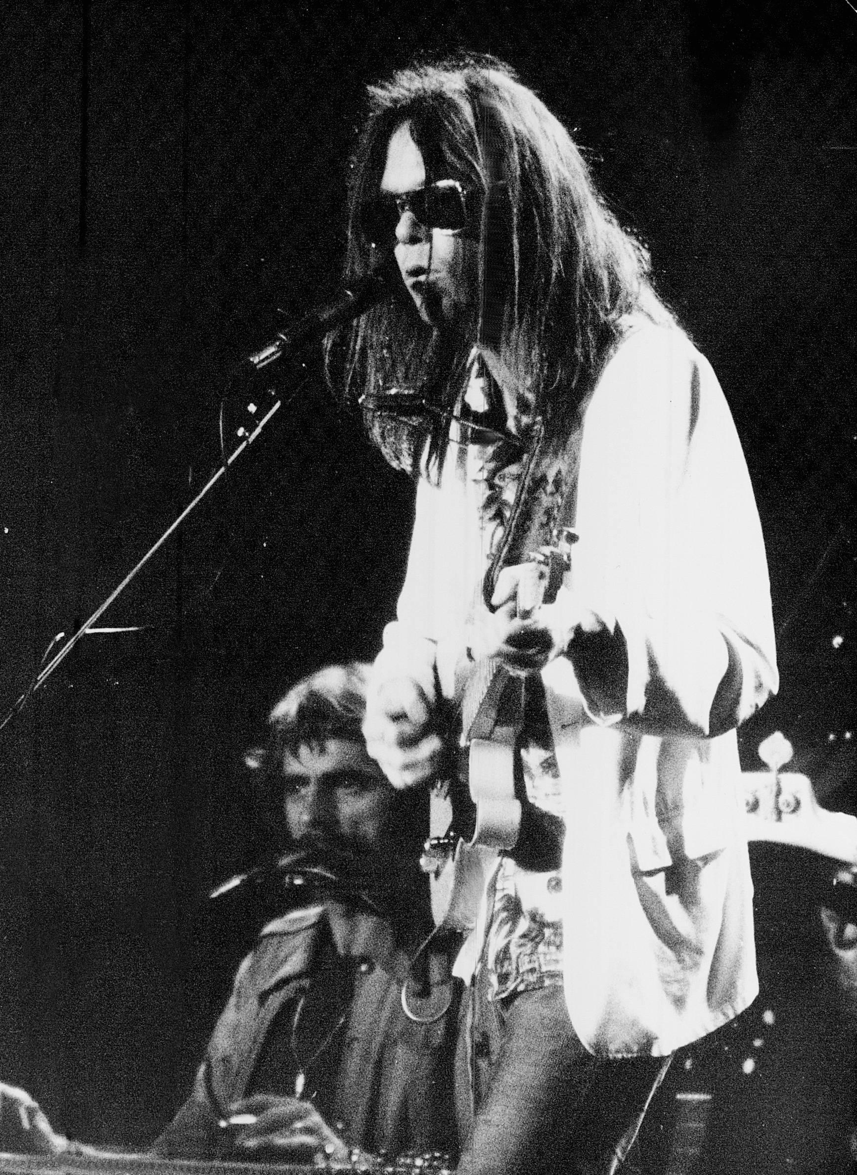 Unknown Portrait Photograph - Neil Young Singing into Microphone Vintage Original Photograph