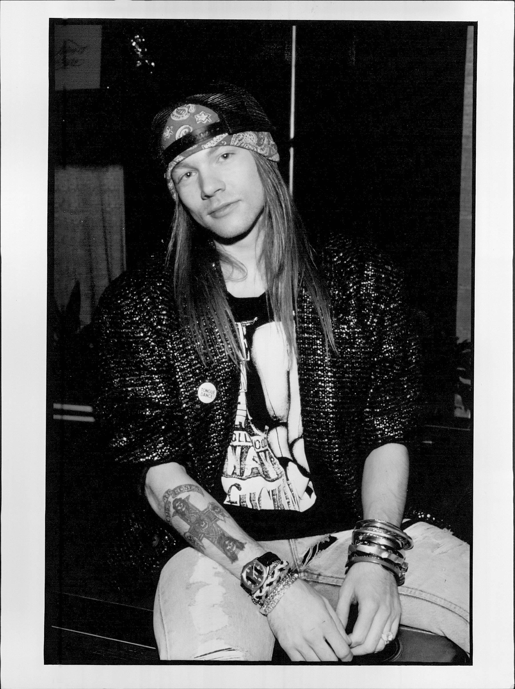 Kevin Mazur Black and White Photograph - Young Axl Rose in Backwards Cap Vintage Original Photograph