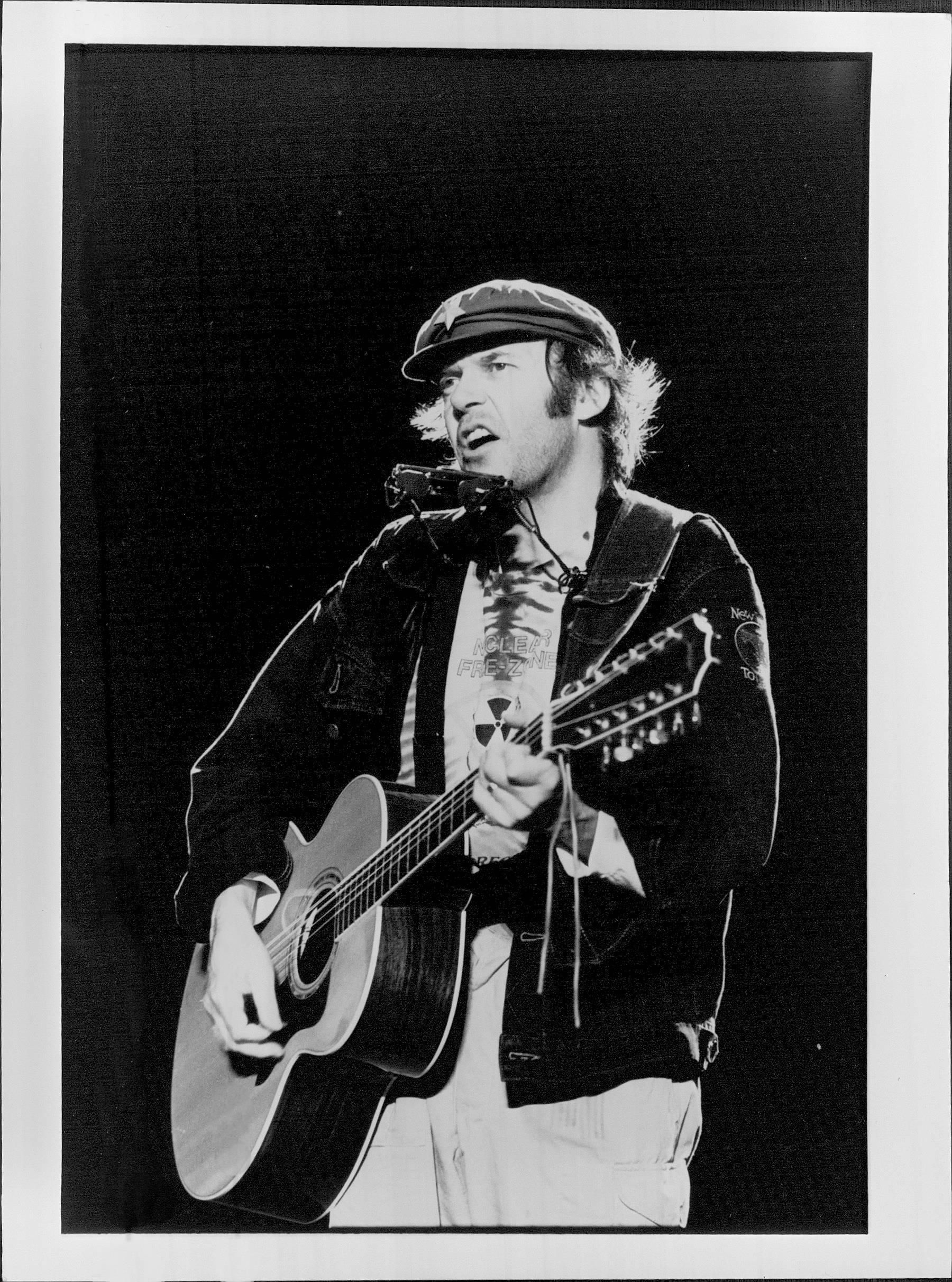 Ebet Roberts Black and White Photograph - Neil Young Playing Guitar in Newsboy Hat Vintage Original Photograph