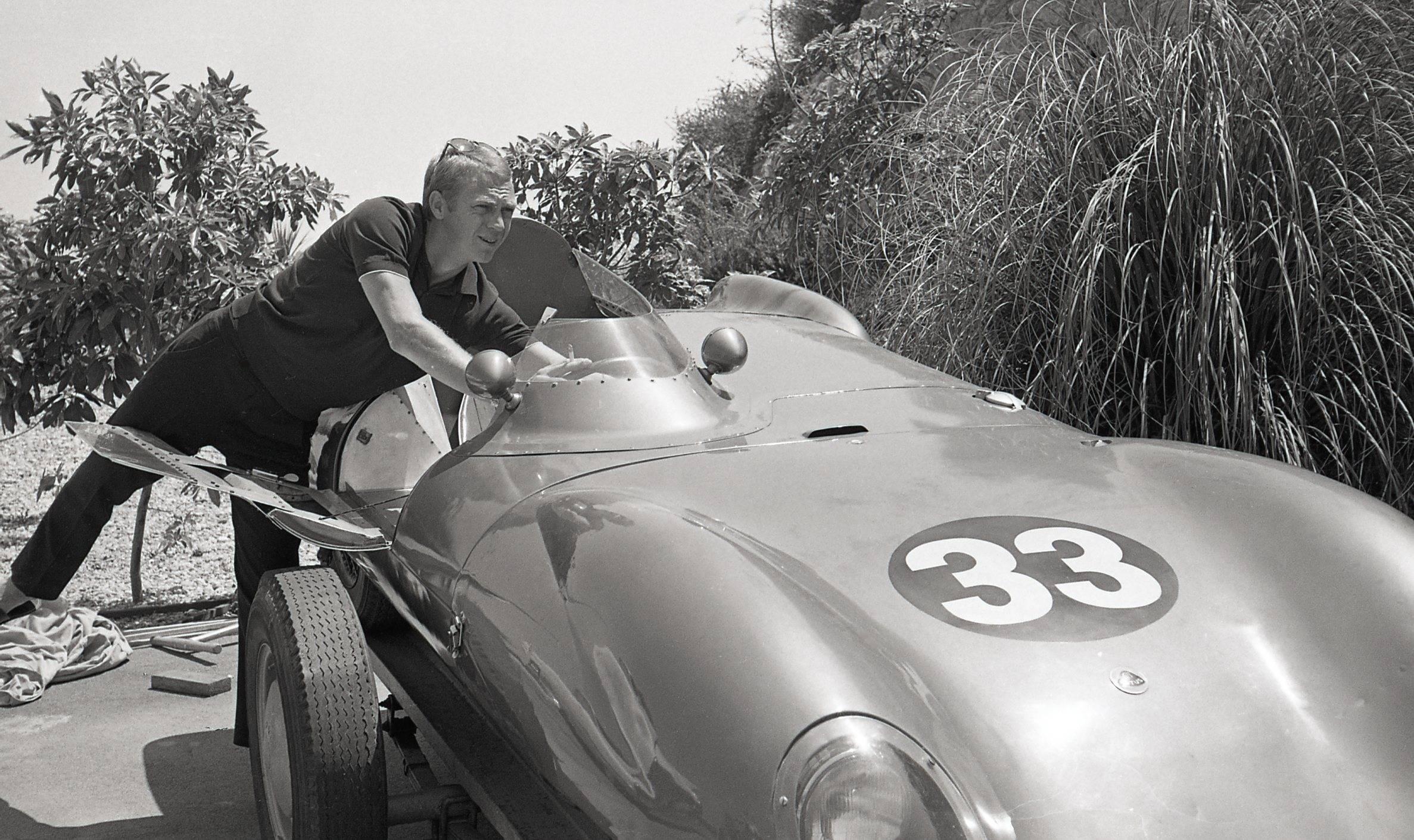 Bill Kobrin Portrait Photograph - Steve McQueen on the Side of His Porsche Fine Art Print