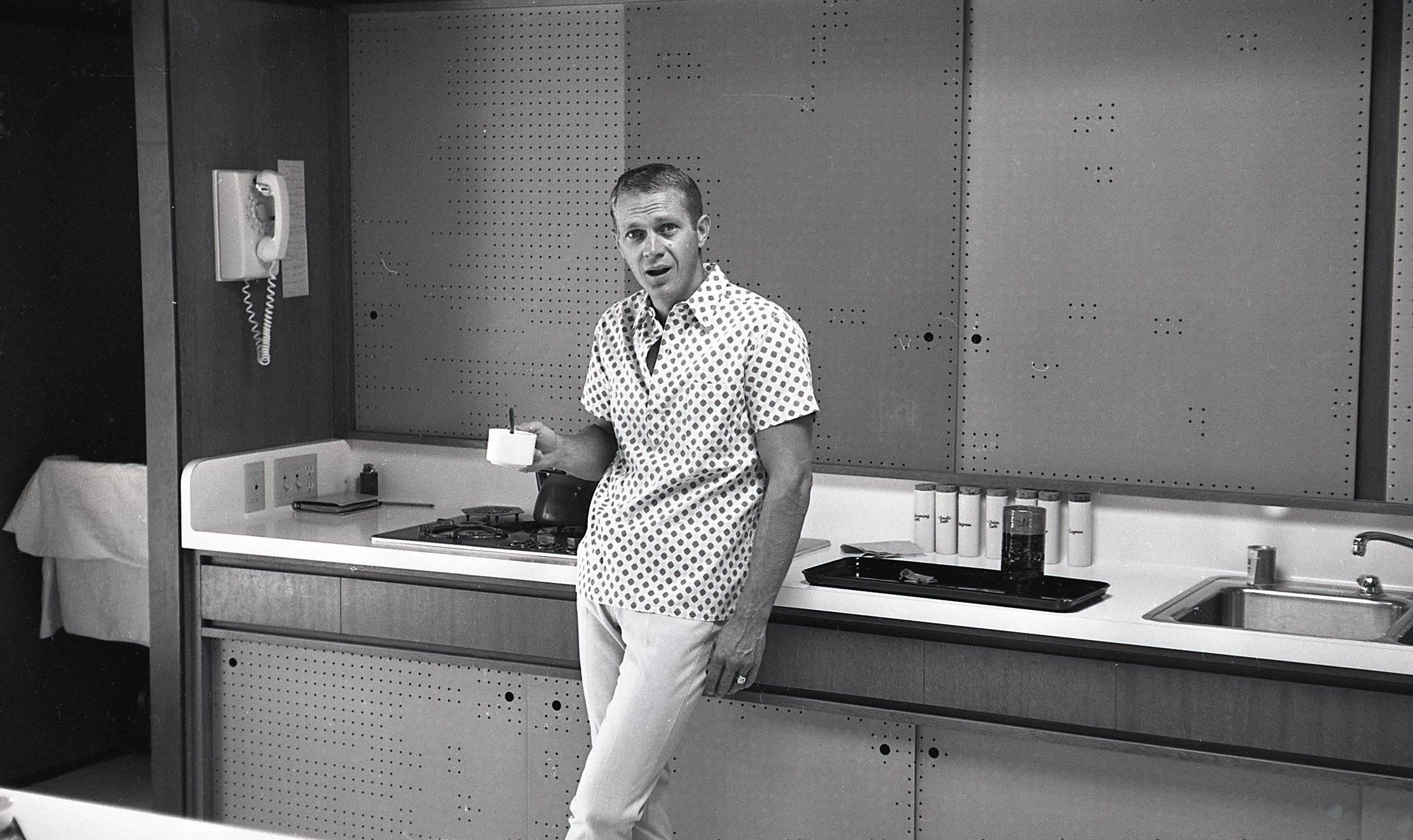 Bill Kobrin Black and White Photograph - Steve McQueen Leaning on Sink Fine Art Print