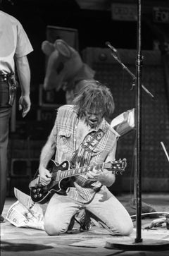 Neil Young Rocking Out on Stage, Falling to Knees Fine Art Print