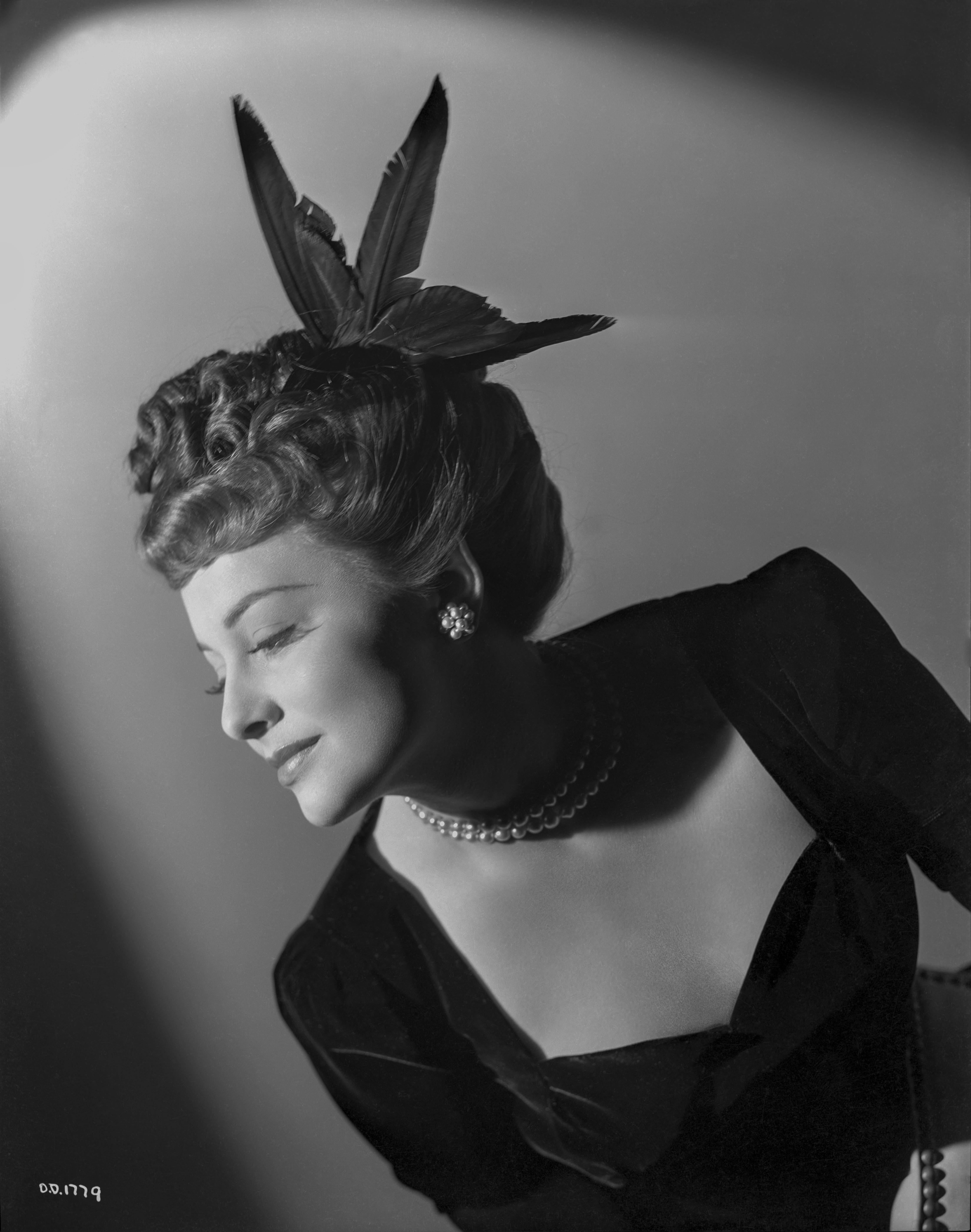 Clarence Sinclair Bull Black and White Photograph - Olivia de Havilland in Feathers Fine Art Print