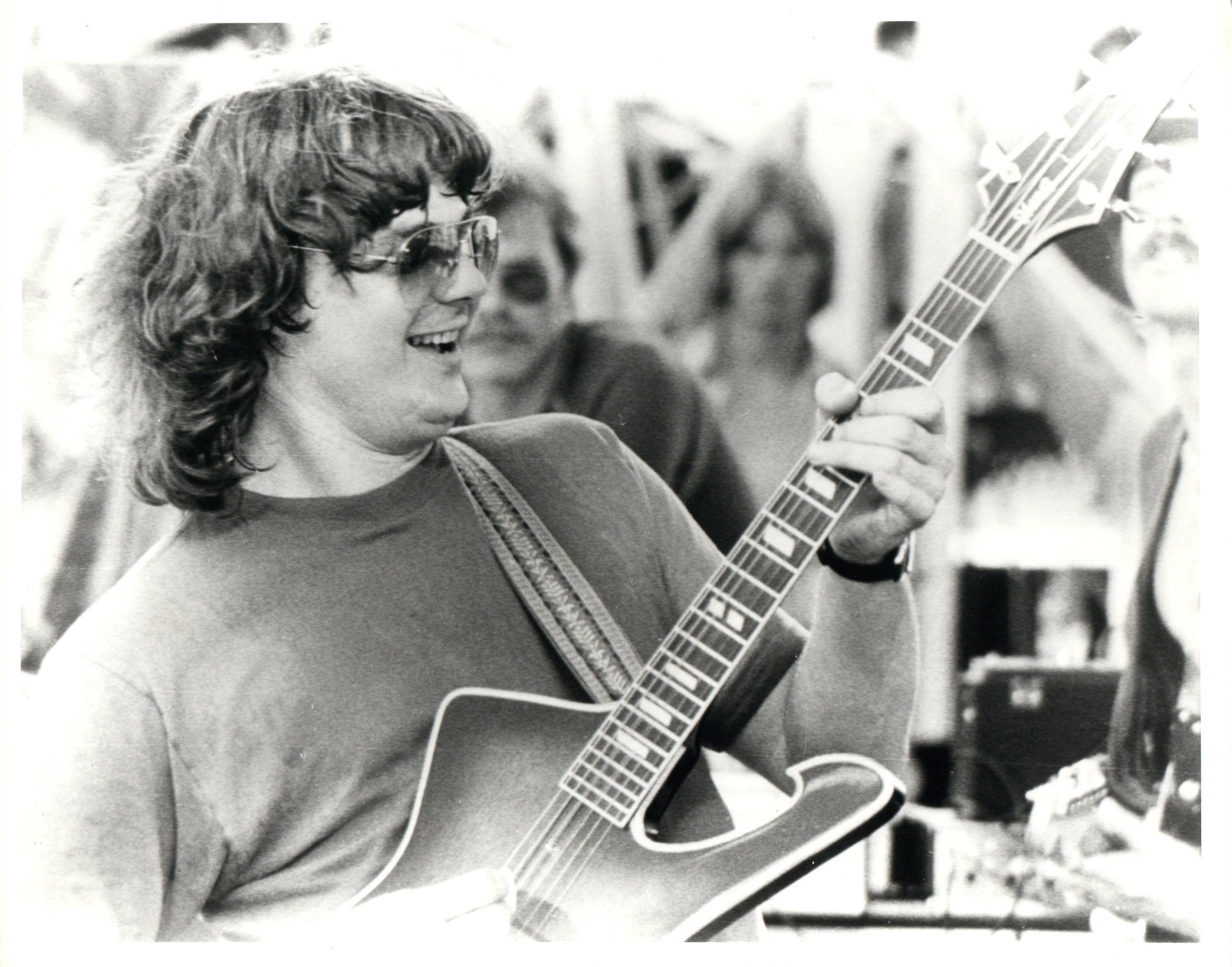 Lee 
Lesser Portrait Photograph - Steve Miller Smiling With Guitar Vintage Original Photograph
