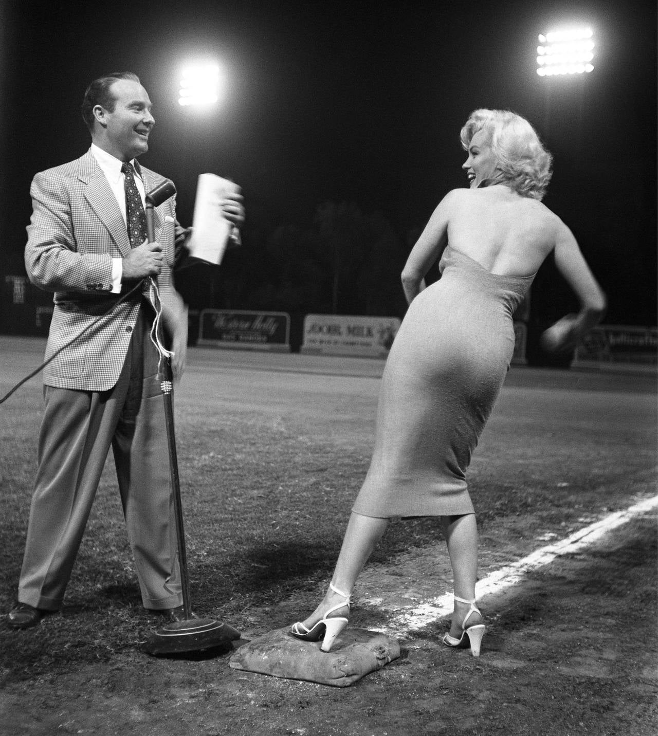 Frank Worth Portrait Photograph - Marilyn Monroe Throws Out the First Pitch