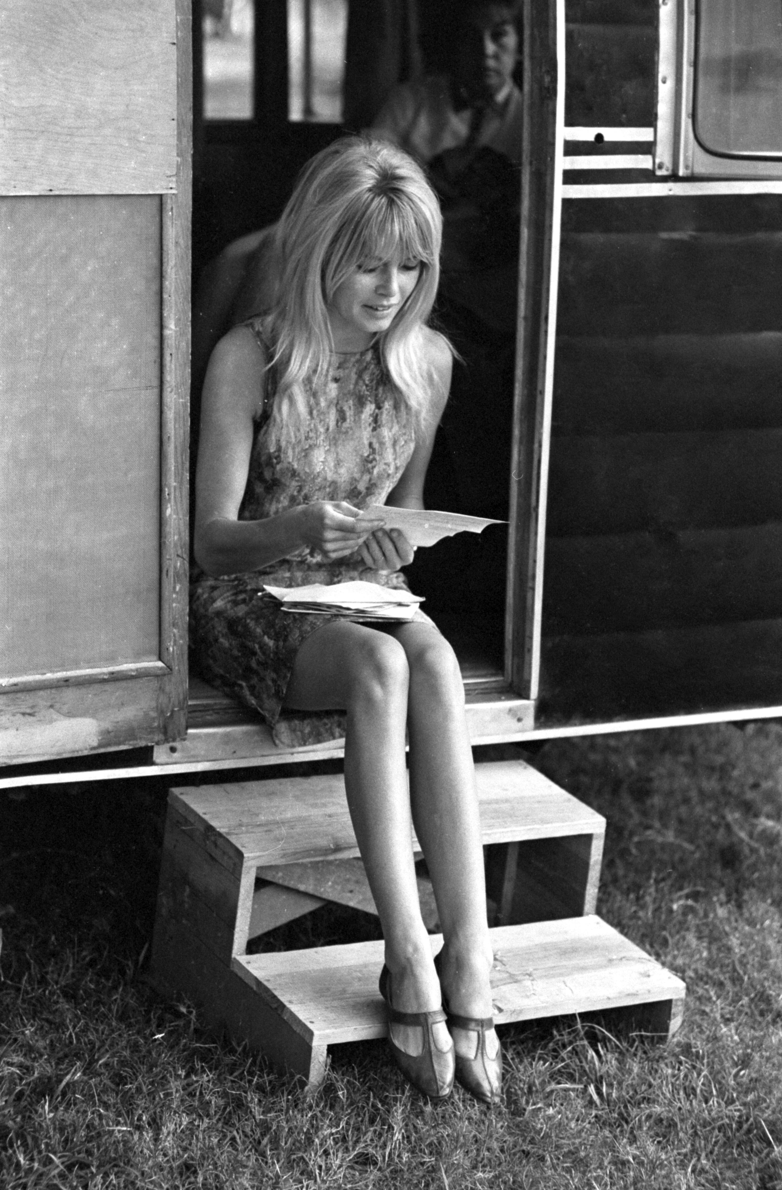 Don Ornitz Black and White Photograph - Brigitte Bardot Reading Behind the Scenes of Viva Maria Fine Art Print