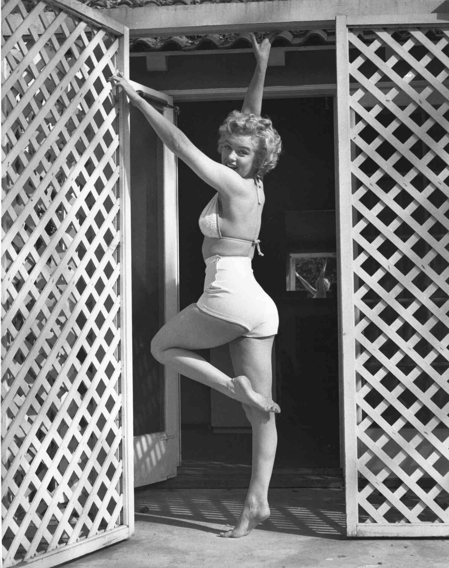 Andre de Dienes Black and White Photograph - Marilyn Monroe, Left Leg Up Oversized Vintage Print