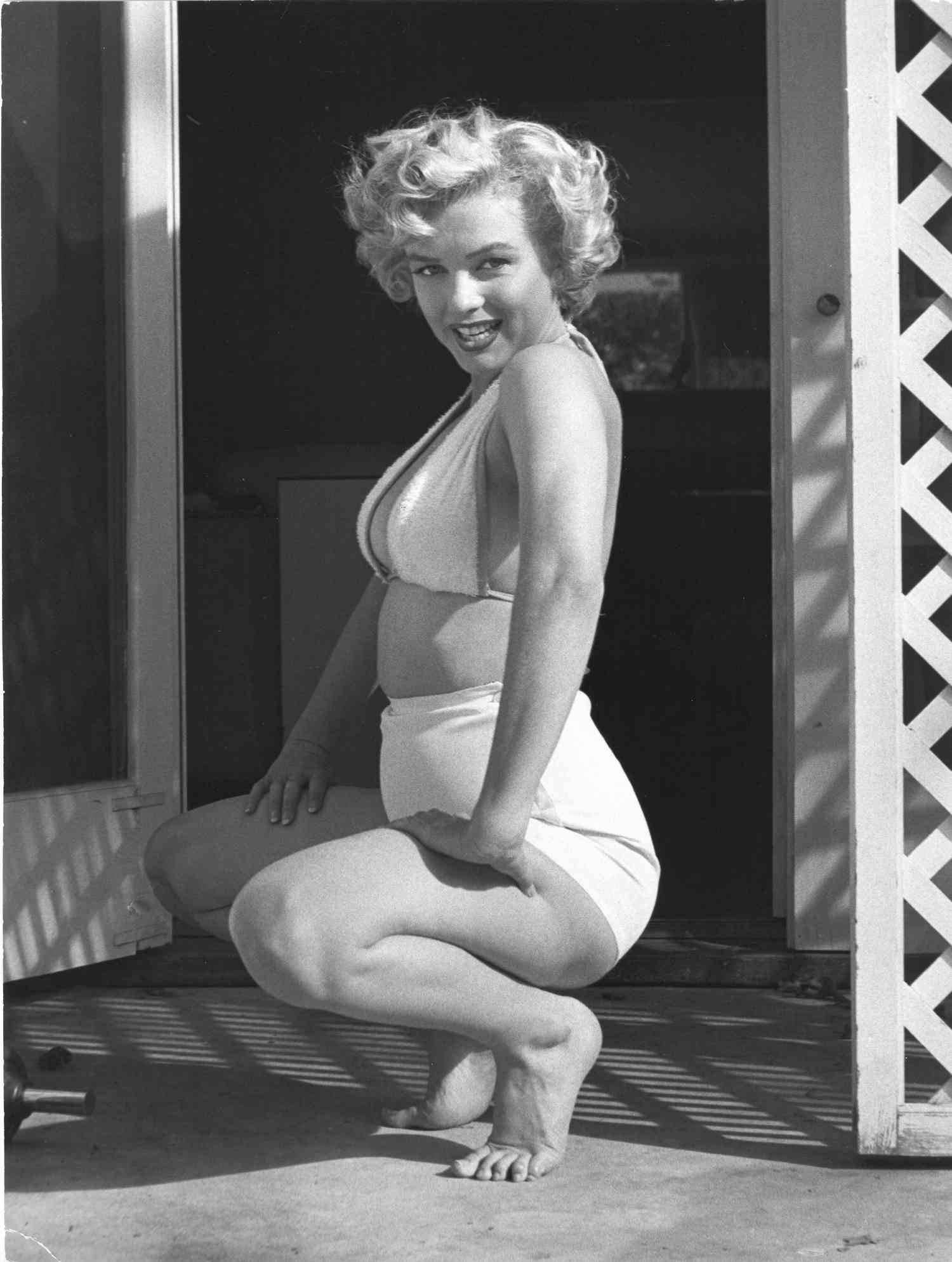 Andre de Dienes Black and White Photograph - Marilyn Squatting Oversized Vintage Print