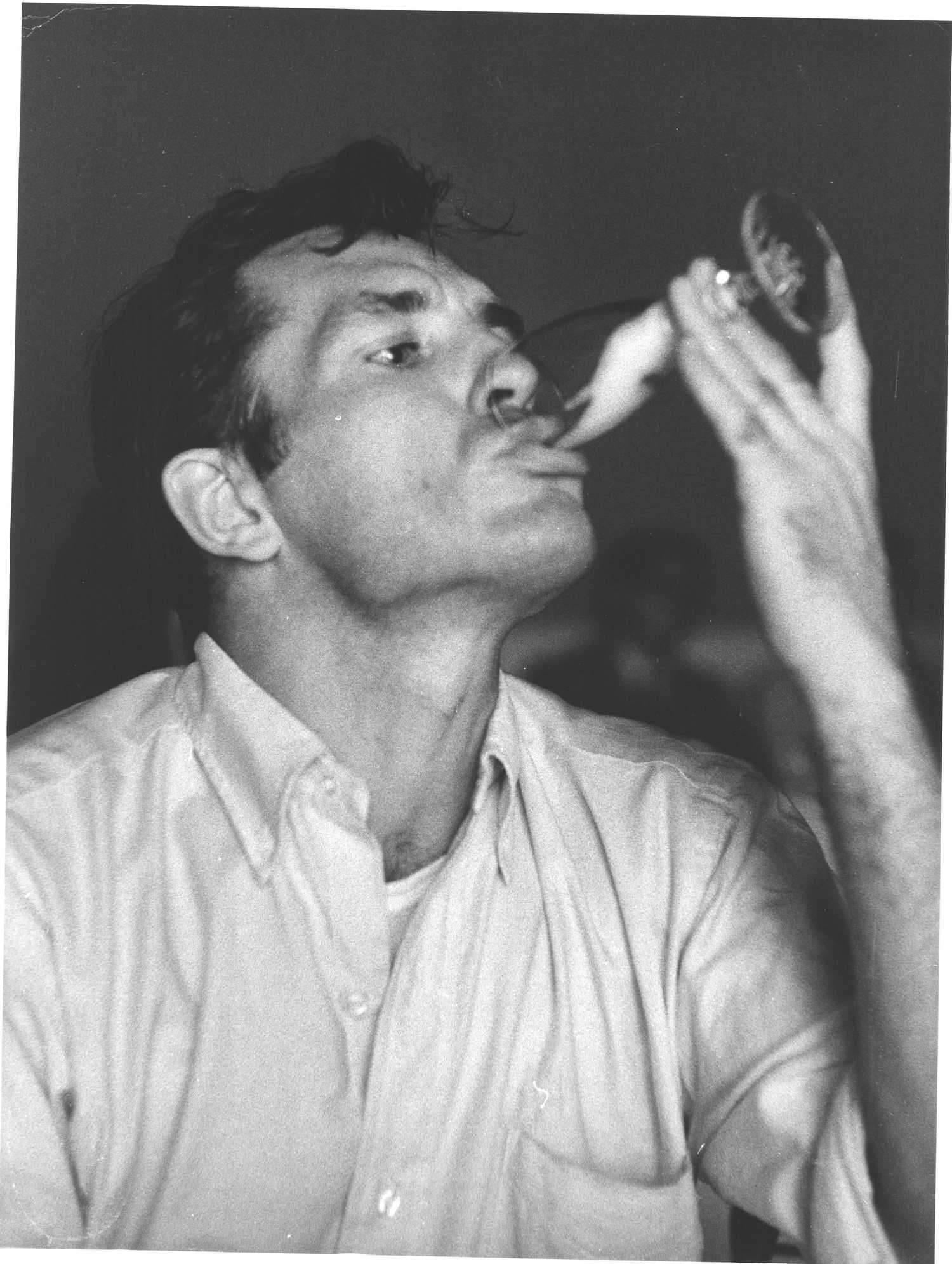 Jerry Yulsman Black and White Photograph - Jack Keouac Drinking in NYC 1957 Original Vintage Oversized Print