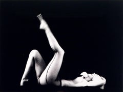 Milton Greene, "Fishnet Stockings" from The Black Sitting, photograph 