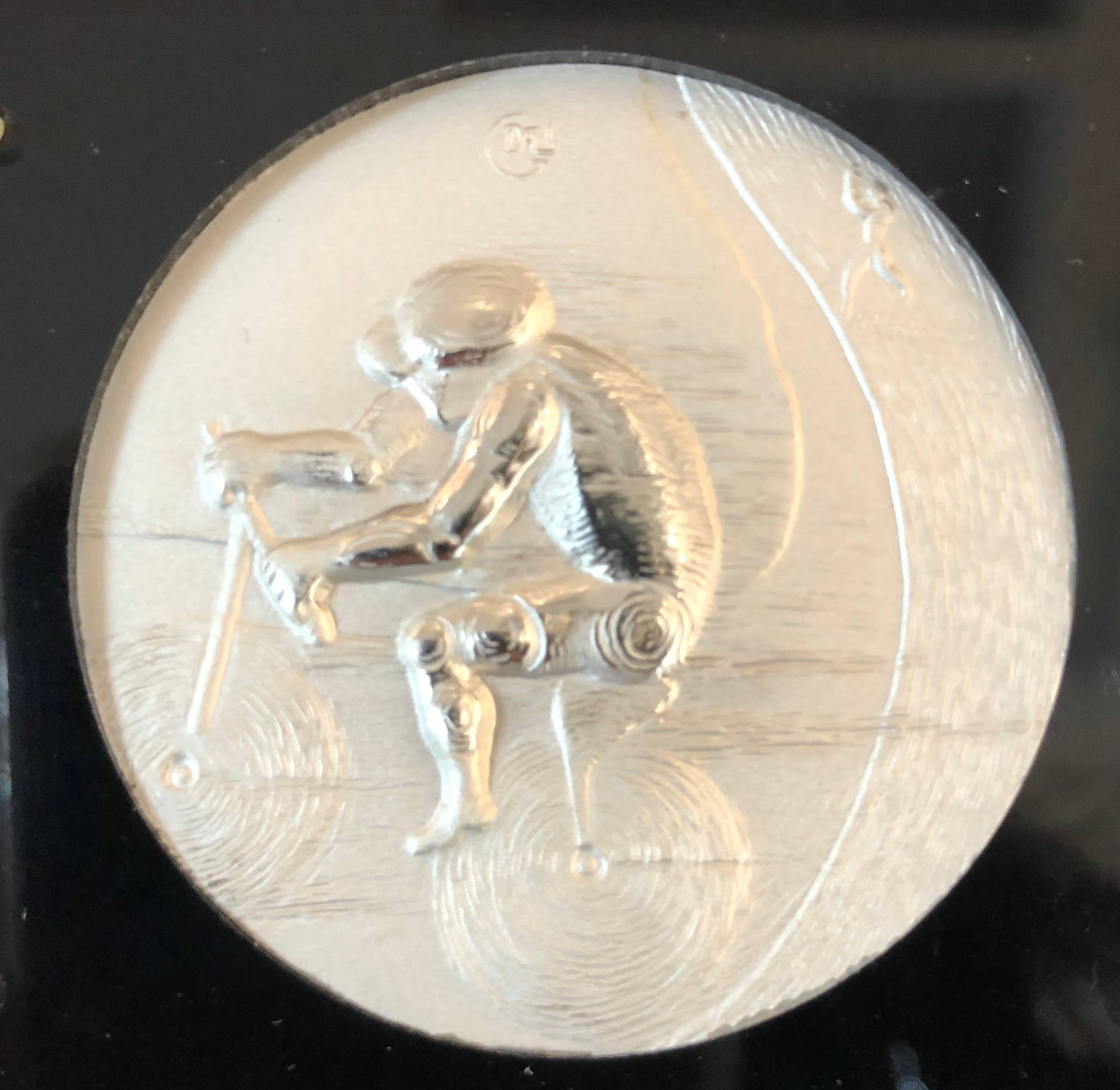 This complete set of 11 silver medallions was done by Salvador Dali for the 1984 Olympics in Los Angeles.  These medallions were made exclusively for Intercoin, West-Germany.  Dali requested that Intercoin mint these medallions in precious metals of