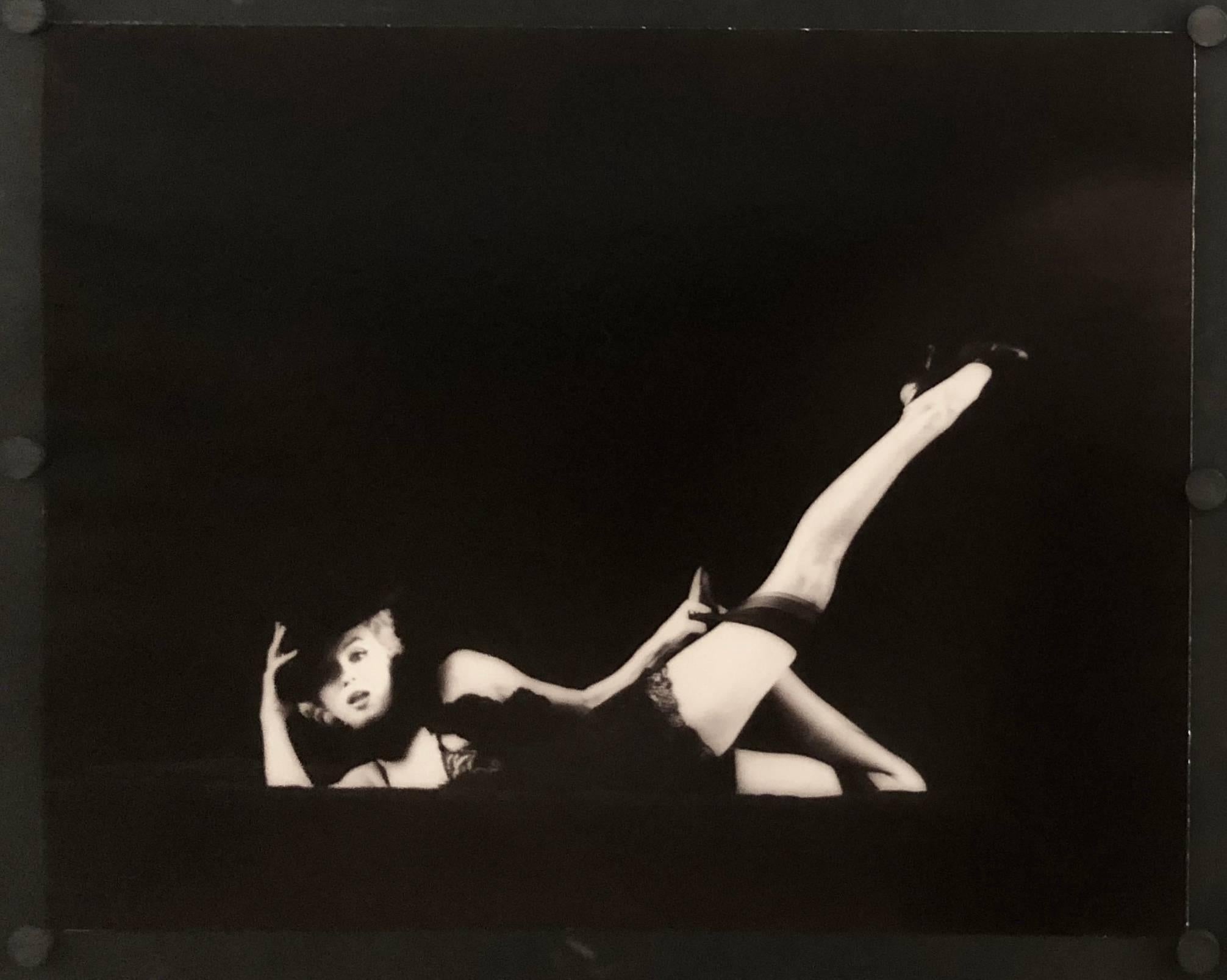 Leg Up from The Black Sitting - Photograph by Milton Greene