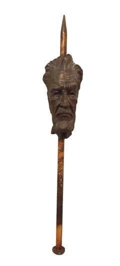 Escultura de acero y hierro titulada: Cabeza de clavo