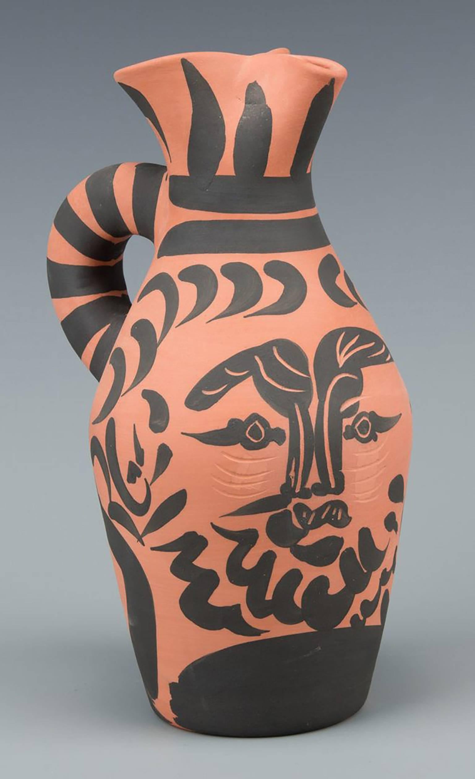 Pablo Picasso (Spanish, 1881-1973)  Yan Barbu  20th century  Ceramic pottery vessel  Black paint on red earthenware  Signed and numbered “Madoura Plein Feu Edition Picasso, 294/300 V. 104″  10.5″ x 6.25″ x 4”  Provenance: acquired from private