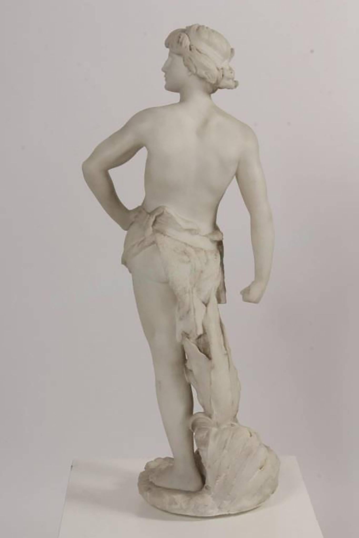 An Original Marble Sculpture of the Biblical David, girded with his stones, preparing to throw at Goliath  Italian Marble Statue  Dimensions: 30″ H (2 1/2 Ft tall)  Unsigned  Condition: Very Good Condition; May be missing a sling in David’s right