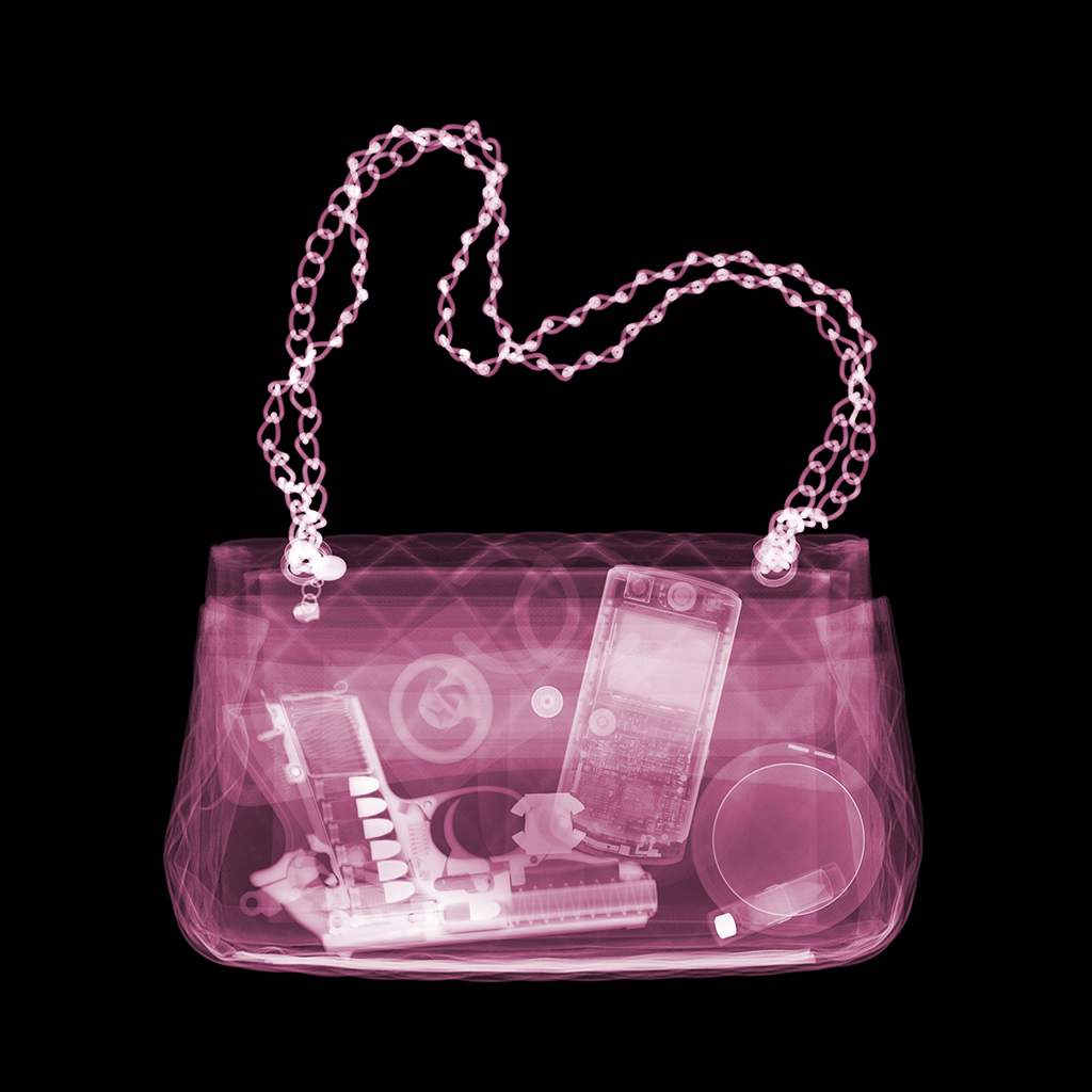 Nick Veasey Still-Life Photograph - Pink Chanel Packing Heat