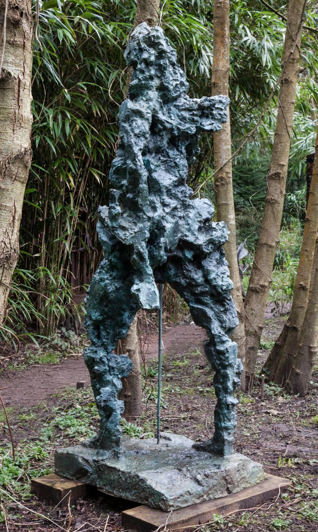 Walking the world  - Gold Figurative Sculpture by Zhang Feng