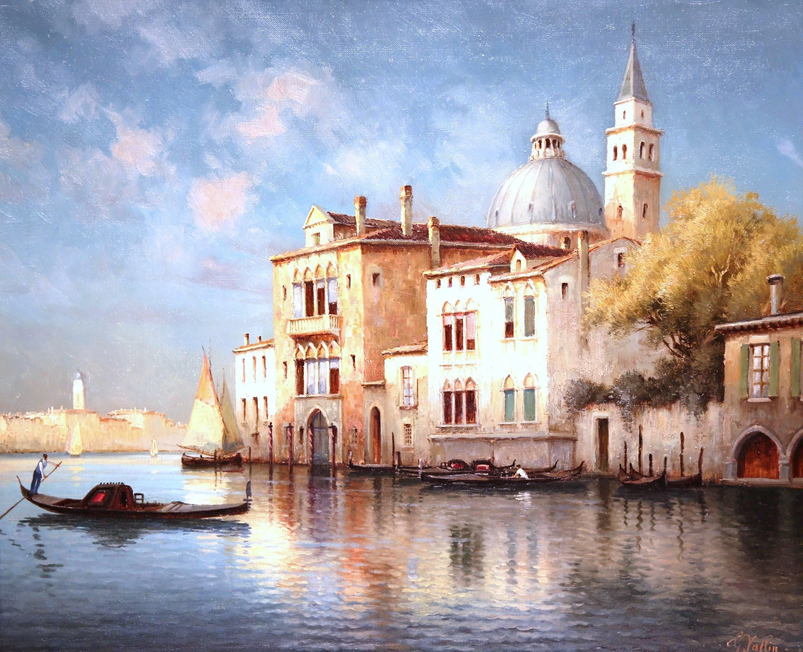 This beautiful, antique oil on canvas depicts an iconic Venetian scene. The painting is set inside a carved frame and is signed on the bottom right R. Vallin, a French artist known for his cityscapes of Venice, Italy and died in 1915. The