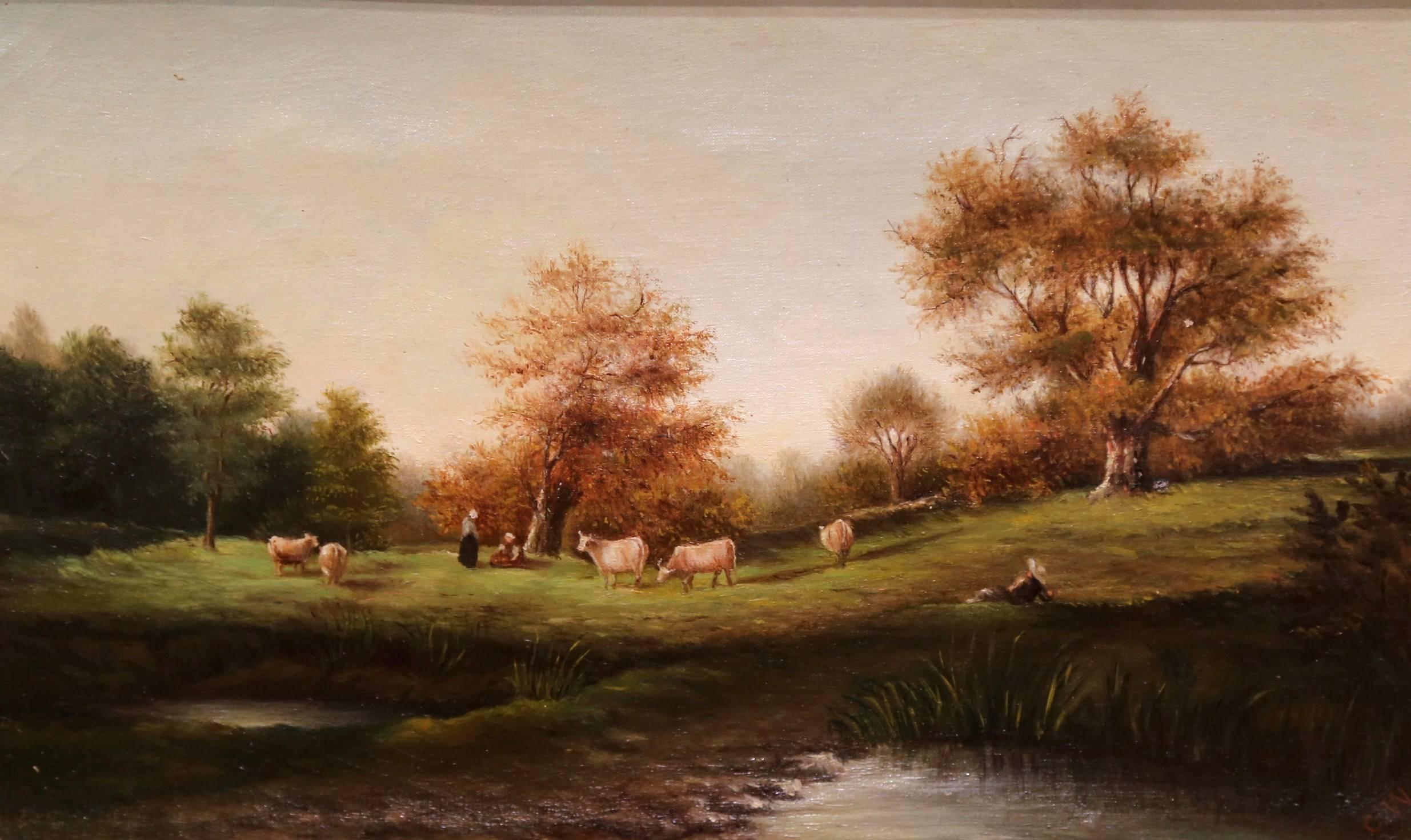 18th Century oil on canvas painting in original gilt frame; crafted circa 1780, the painting features a landscape with cows and farmers with a pond in the foreground. Beautiful carved frame with gold leaf finish. The art is signed Wolf with hand