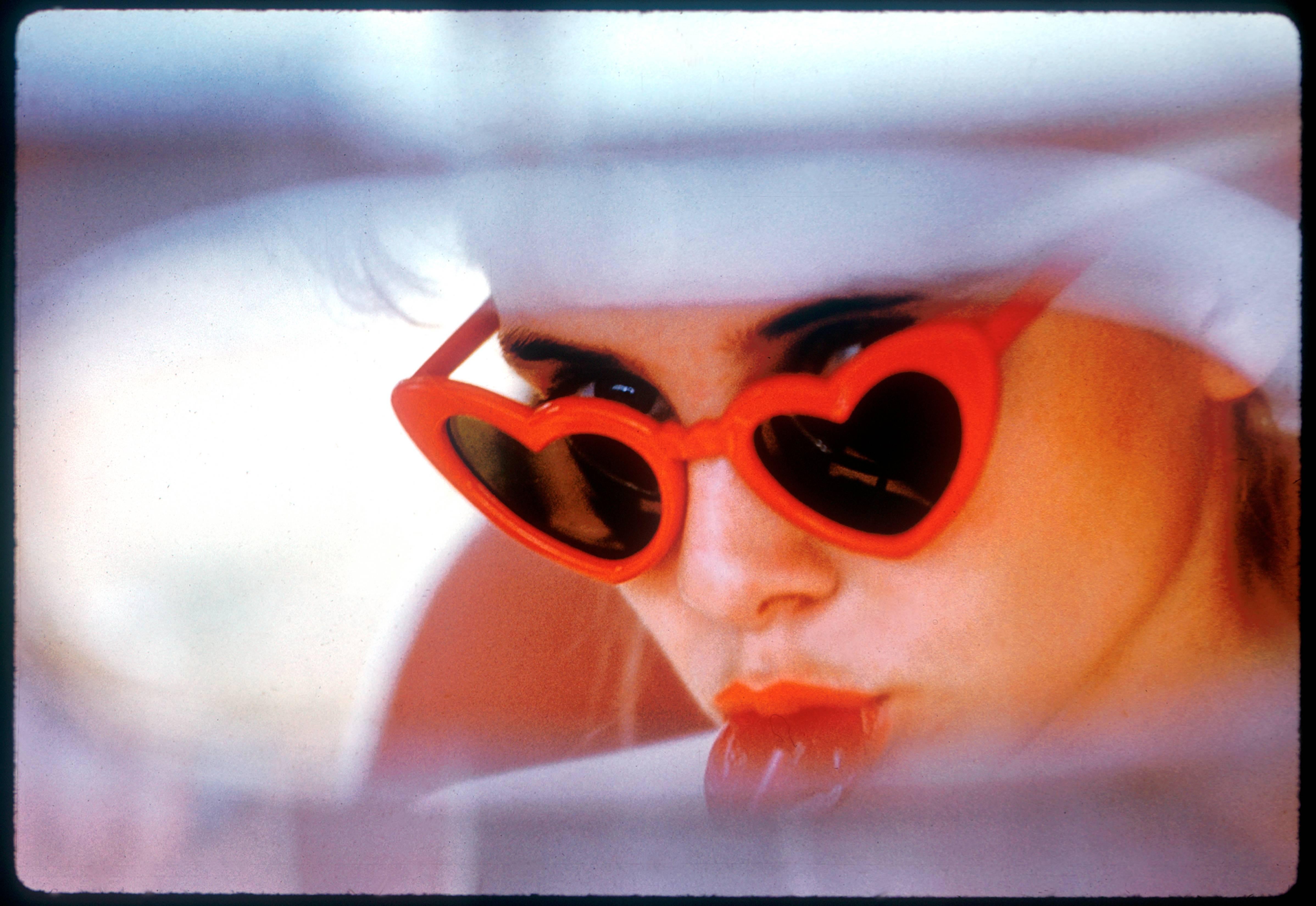 Bert Stern Color Photograph - Lolita Classic heart shaped glasses
