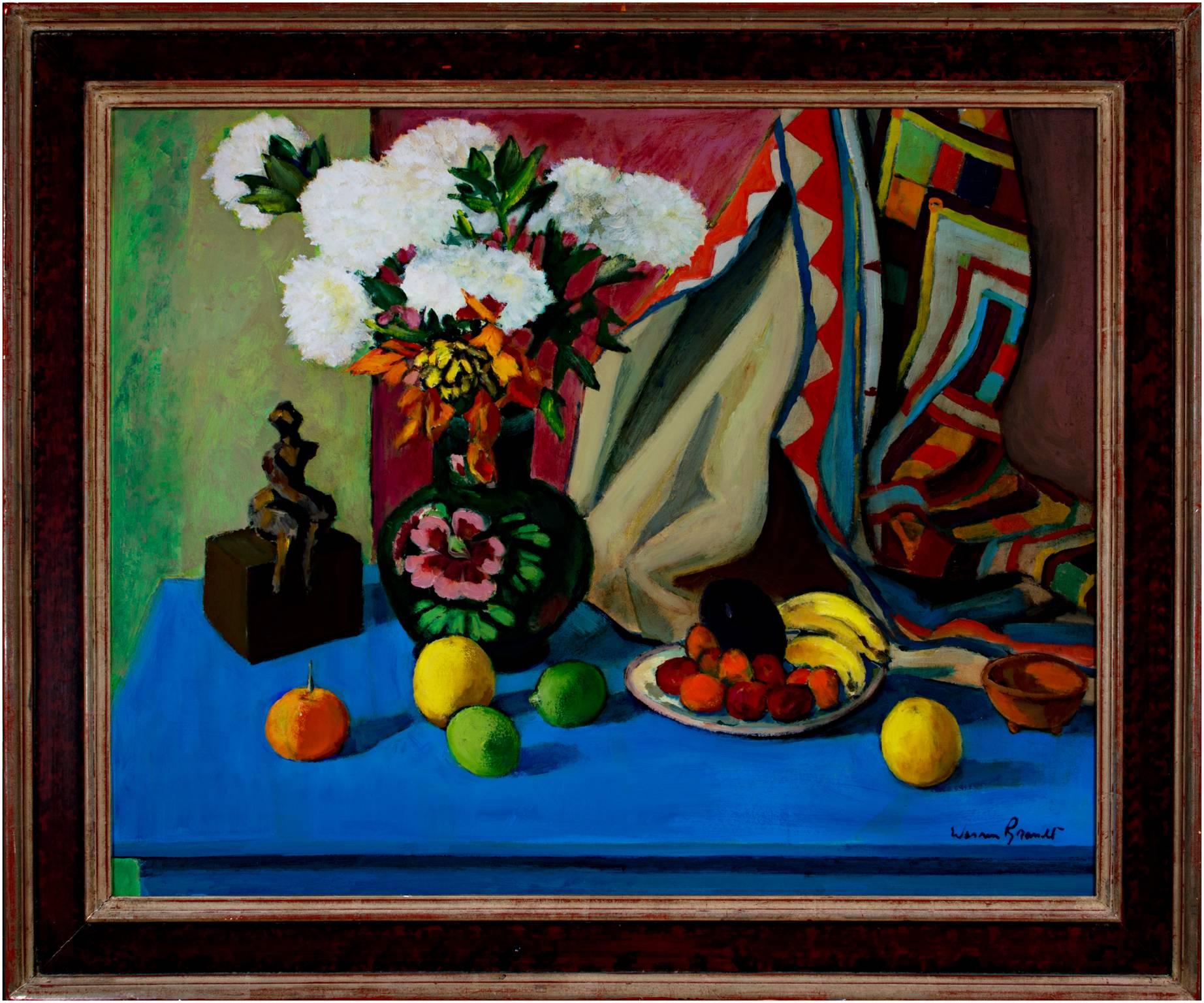 Rich, colorful, expressionist still life by American artist Warren Brandt featuring a decorative vase with white flowers, an assortment of fruit, and a small wooden sculpture against a bright blue table. 

24