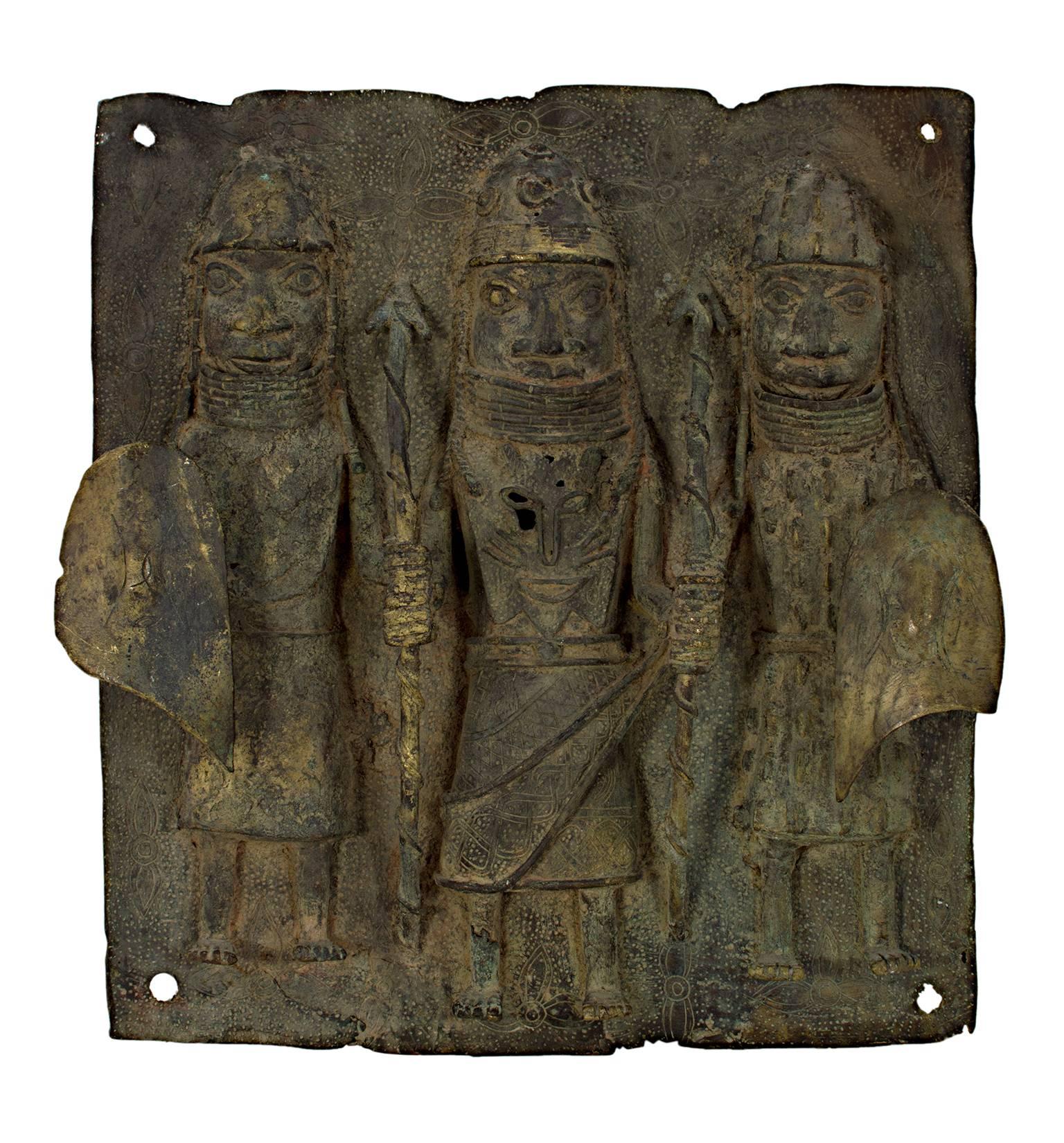 Unknown Figurative Sculpture - "King with Two Tribesmen Nigeria- Benin Tribe, " a Bronze Relief Sculpture