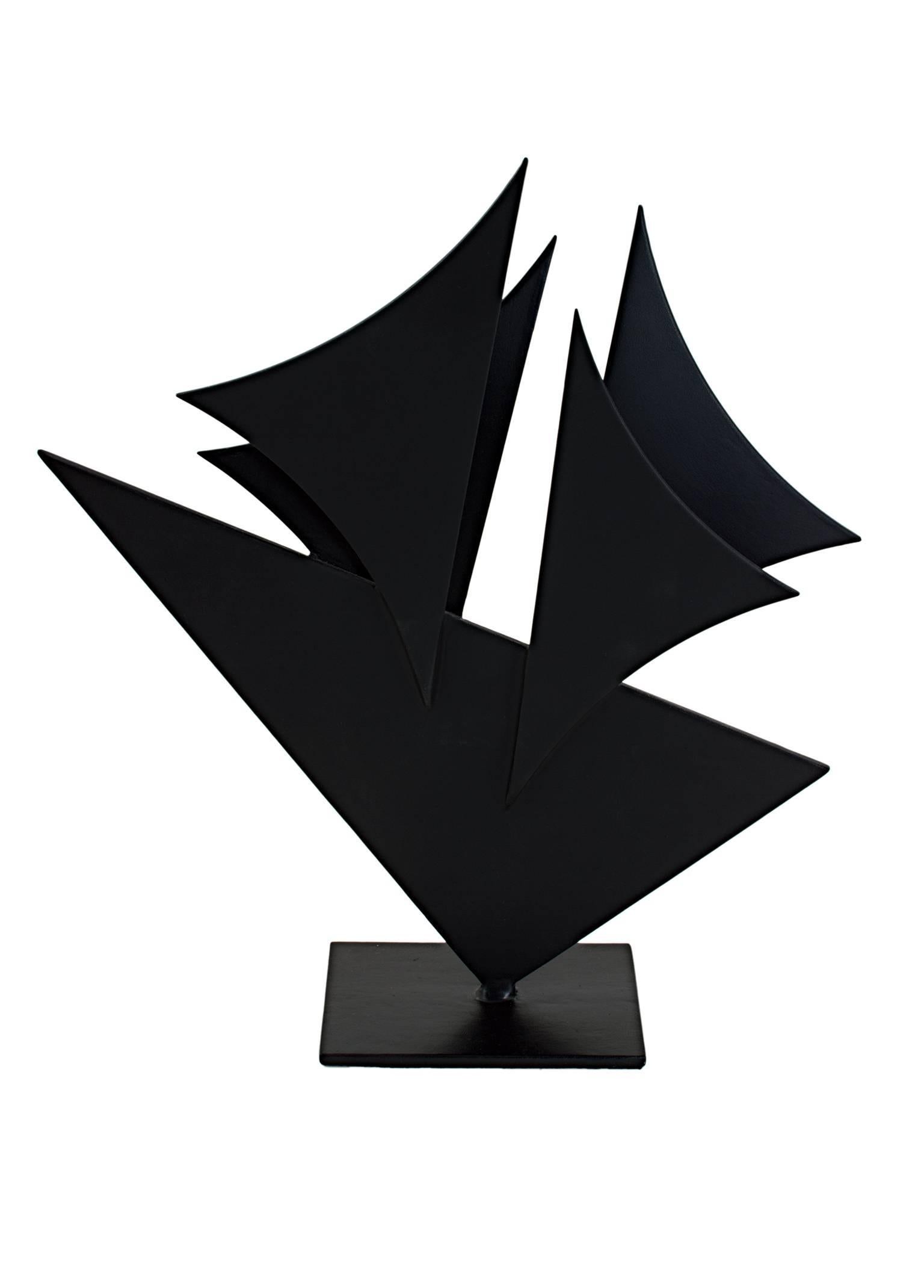 "Midnight Sea Shapes" is a painted steel sculpture by Ralph Wickstrom. It consists of five triangle shapes intersecting. The shapes are reminiscent of sails and are painted in a dark gray, nearly black, color. 

16 1/4" x 14 1/4" sculpture

Ralph