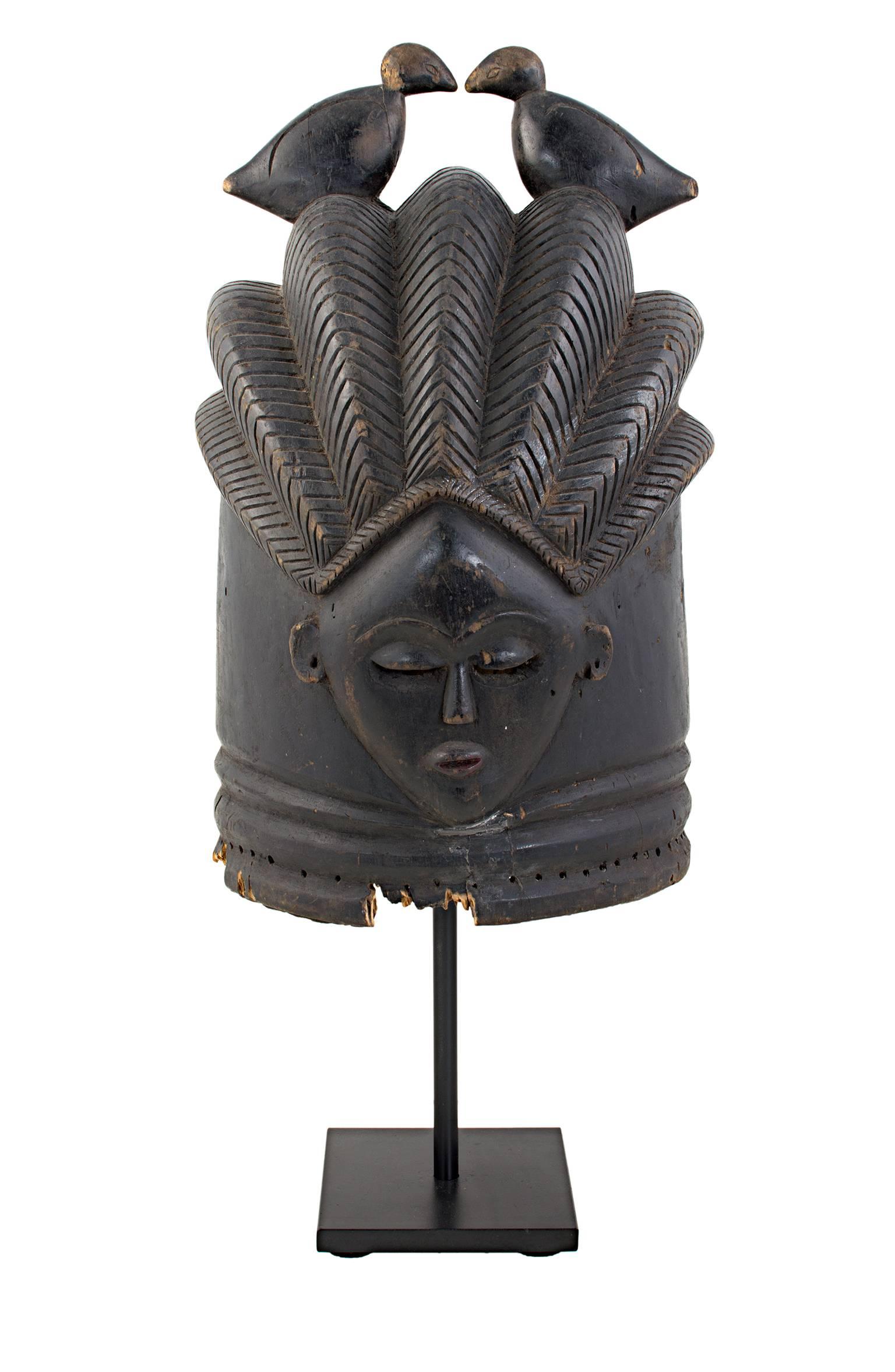 Unknown Figurative Sculpture - "Mende Mask, " Carved Wooden Mask created in Sierra Leone c. 1930