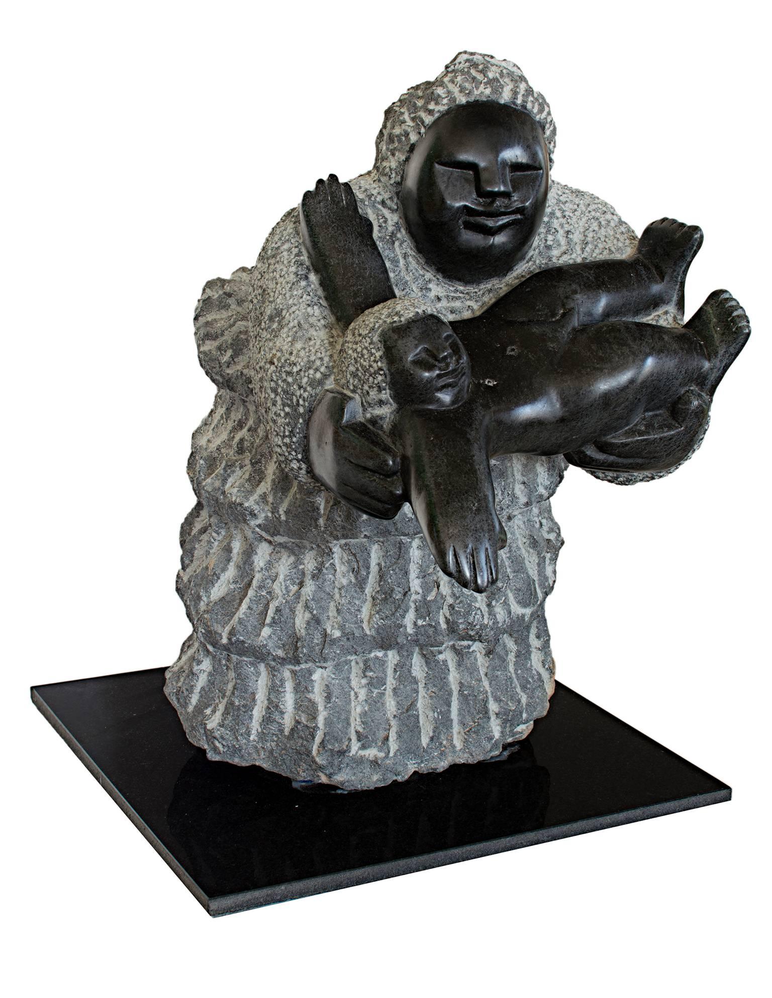 Colleen Madamombe Figurative Sculpture - "Mother Playing with a New Baby Boy C-12, " Black Serpentine signed by Madamombe