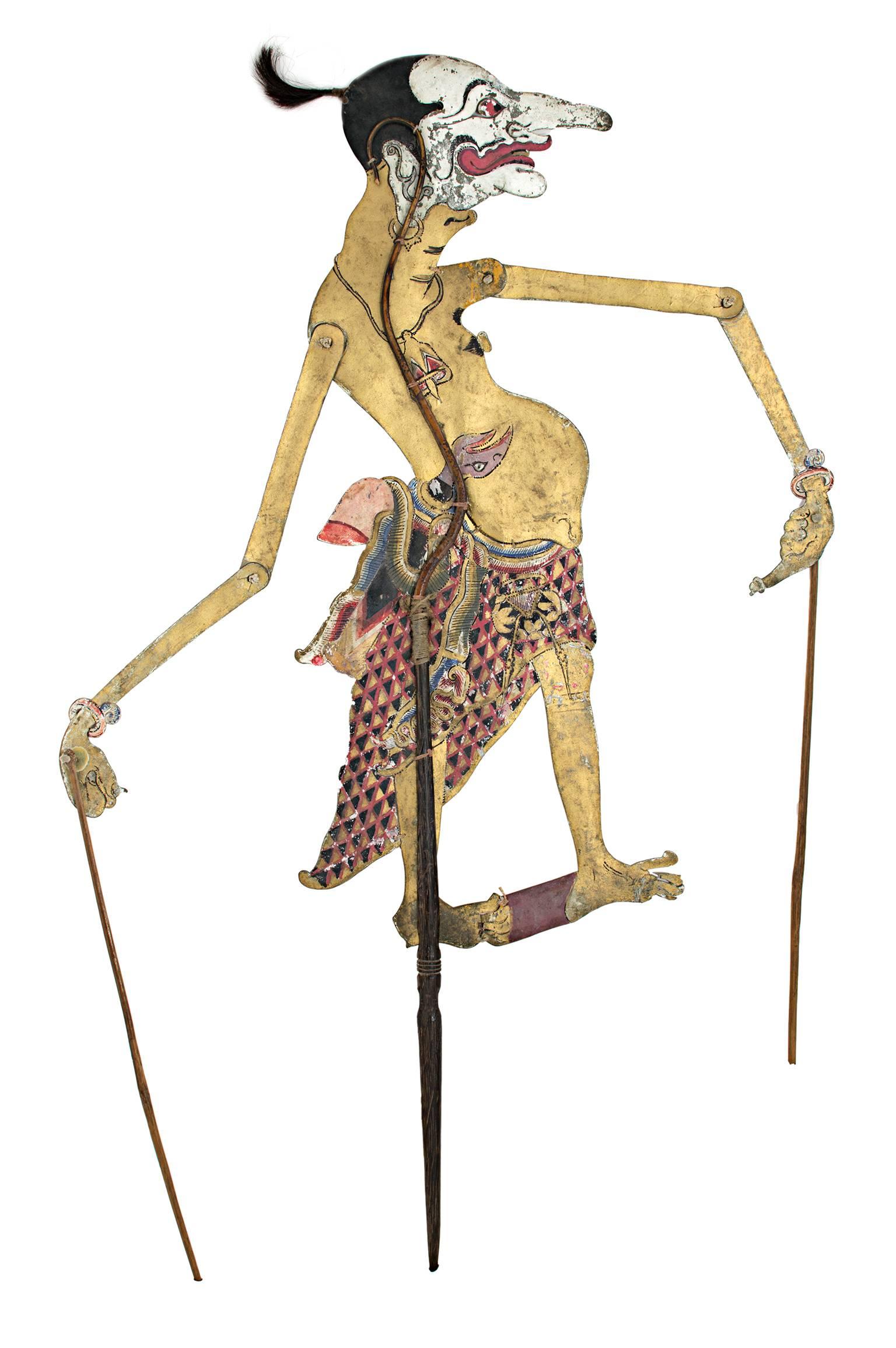 Unknown Figurative Sculpture - "Indonesian Shadow Puppet, " Wood and Leather created in Indonesia c. 1800s 