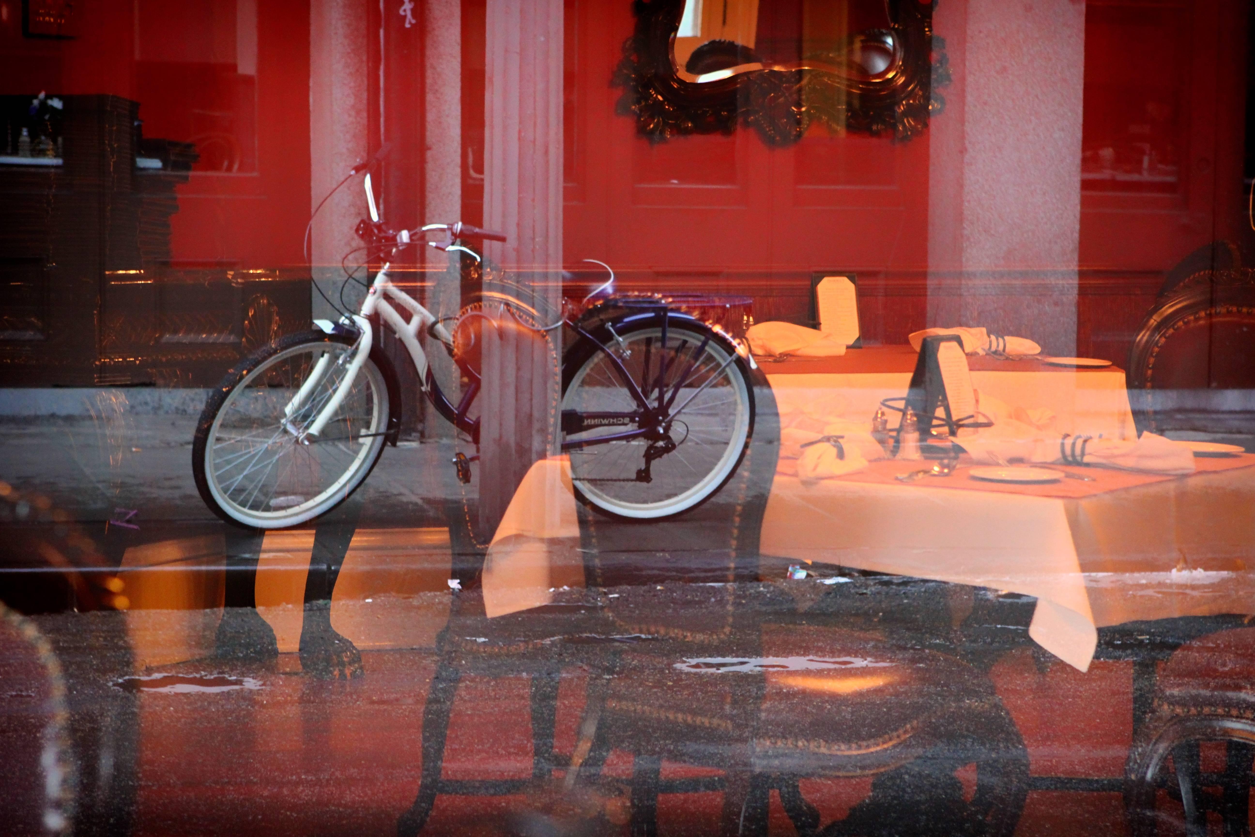 Kelly Ludwig Still-Life Photograph - Window Bike, New Orleans, LA