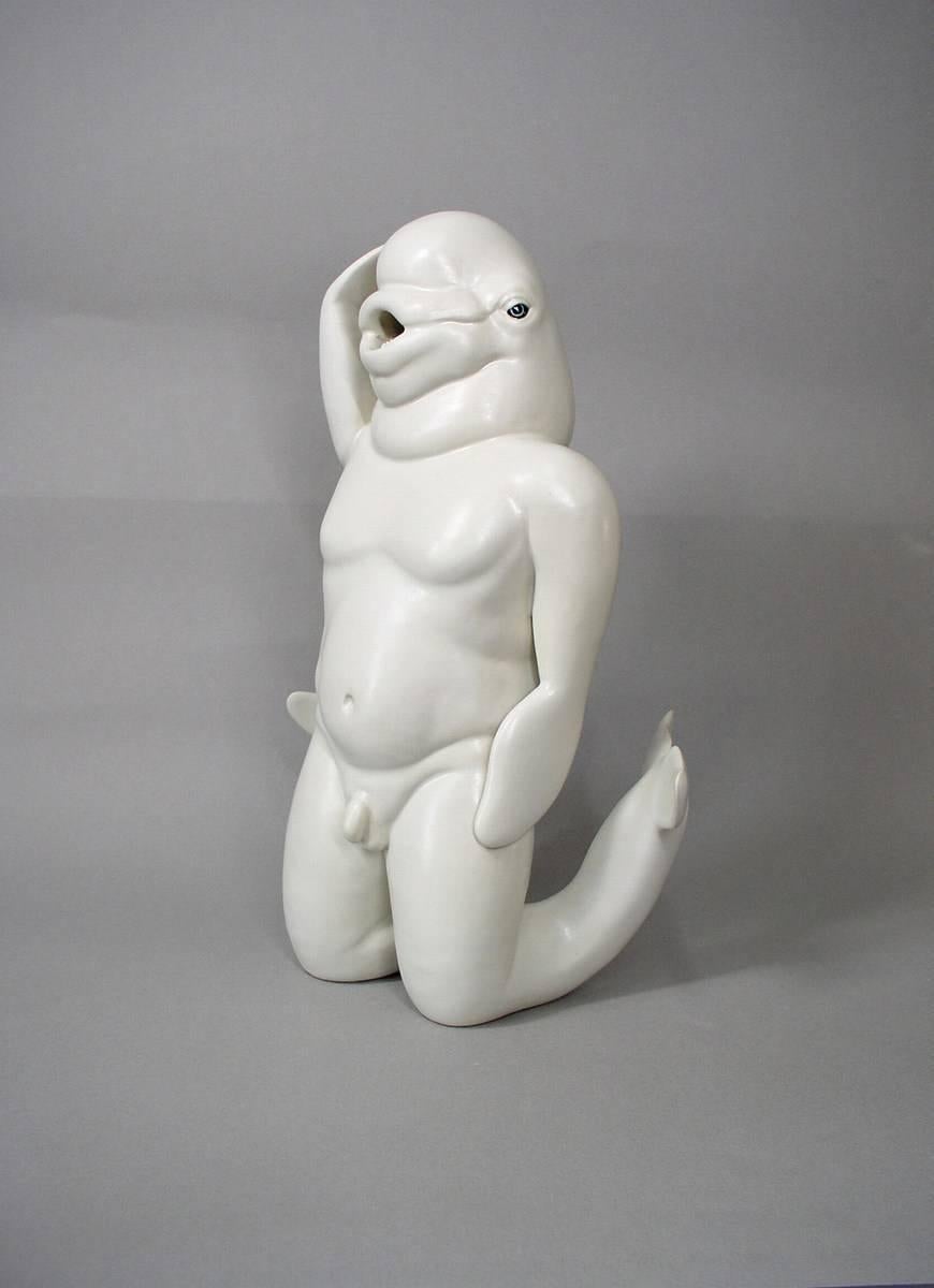 Beluga arrodillada