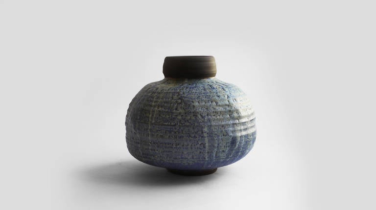 Stoneware vessel with blue and white glazes