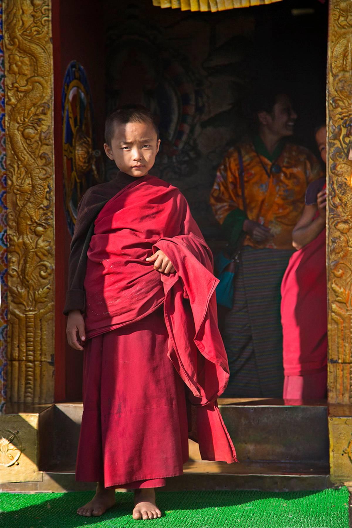 H. Allen Benowitz Color Photograph - Monk in Waiting; Trongza Dzong, Bhutan- Photograph
