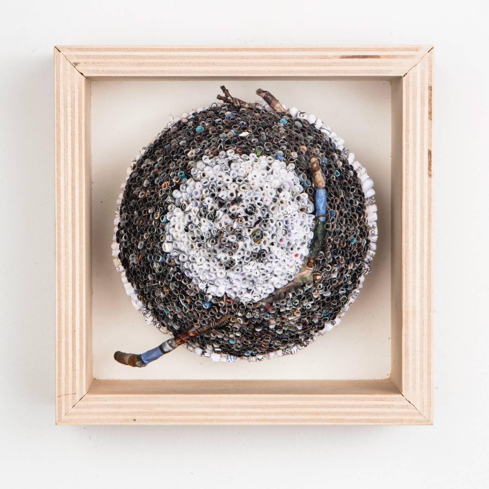 Jaynie Gillman Crimmins, a Brooklyn based artist, has been creating art from her shredded financial statements and mail since 2009.  She currently works with her junk mail which is difficult to recycle because the inks have high concentrations of