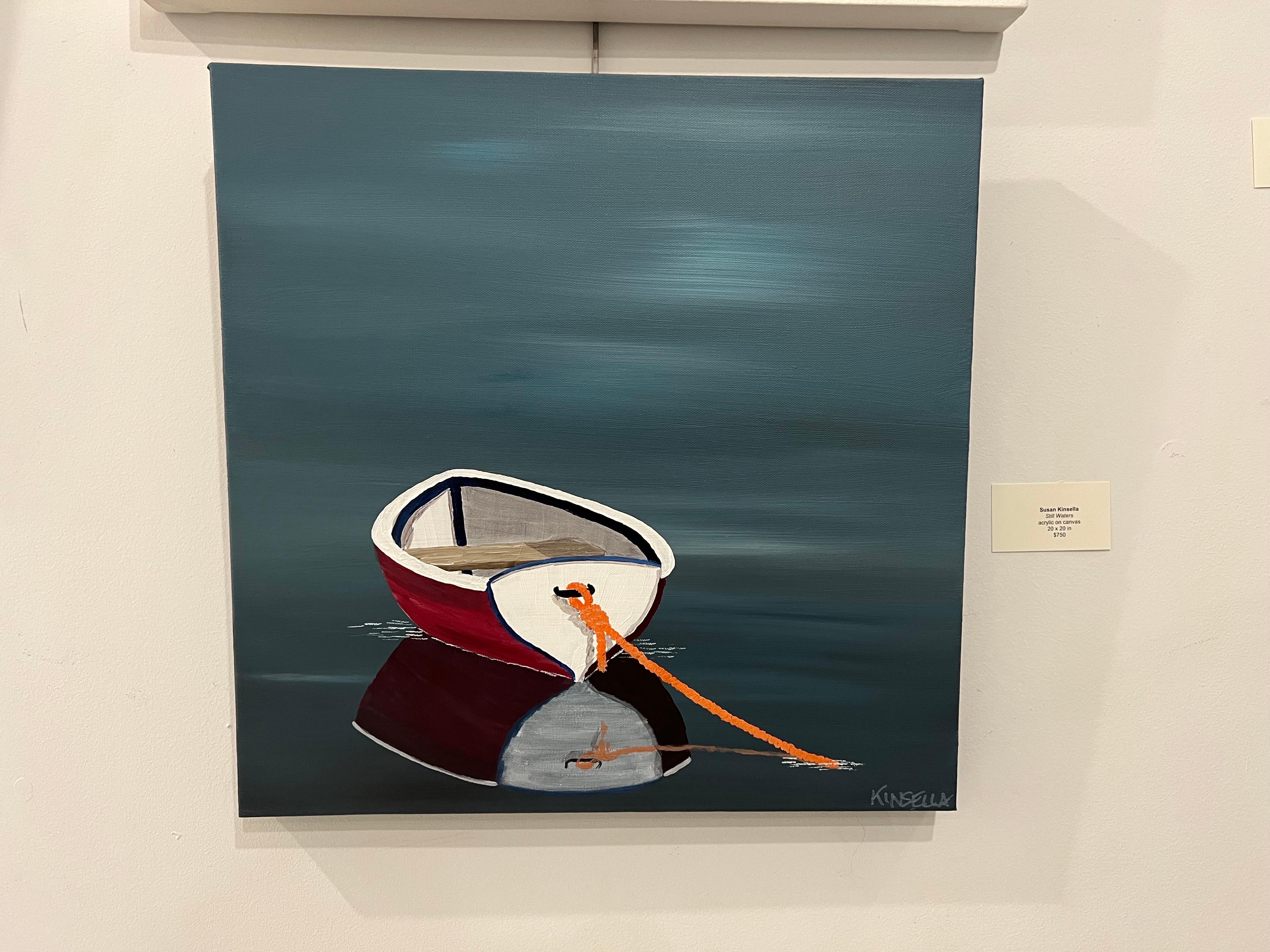 'Still Waters' is a square representational acrylic on canvas painting of a row boat with blue accents float tethered by an orange rope created by American artist Susan Kinsella in 2023. Featuring an exquisite palette mostly made of navy, gray and