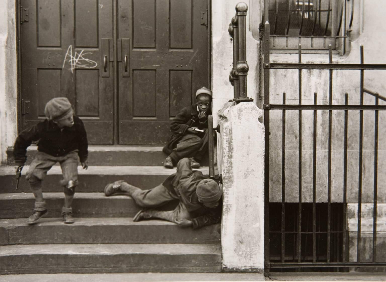 Helen Levitt Black and White Photograph - Cops and Robbers