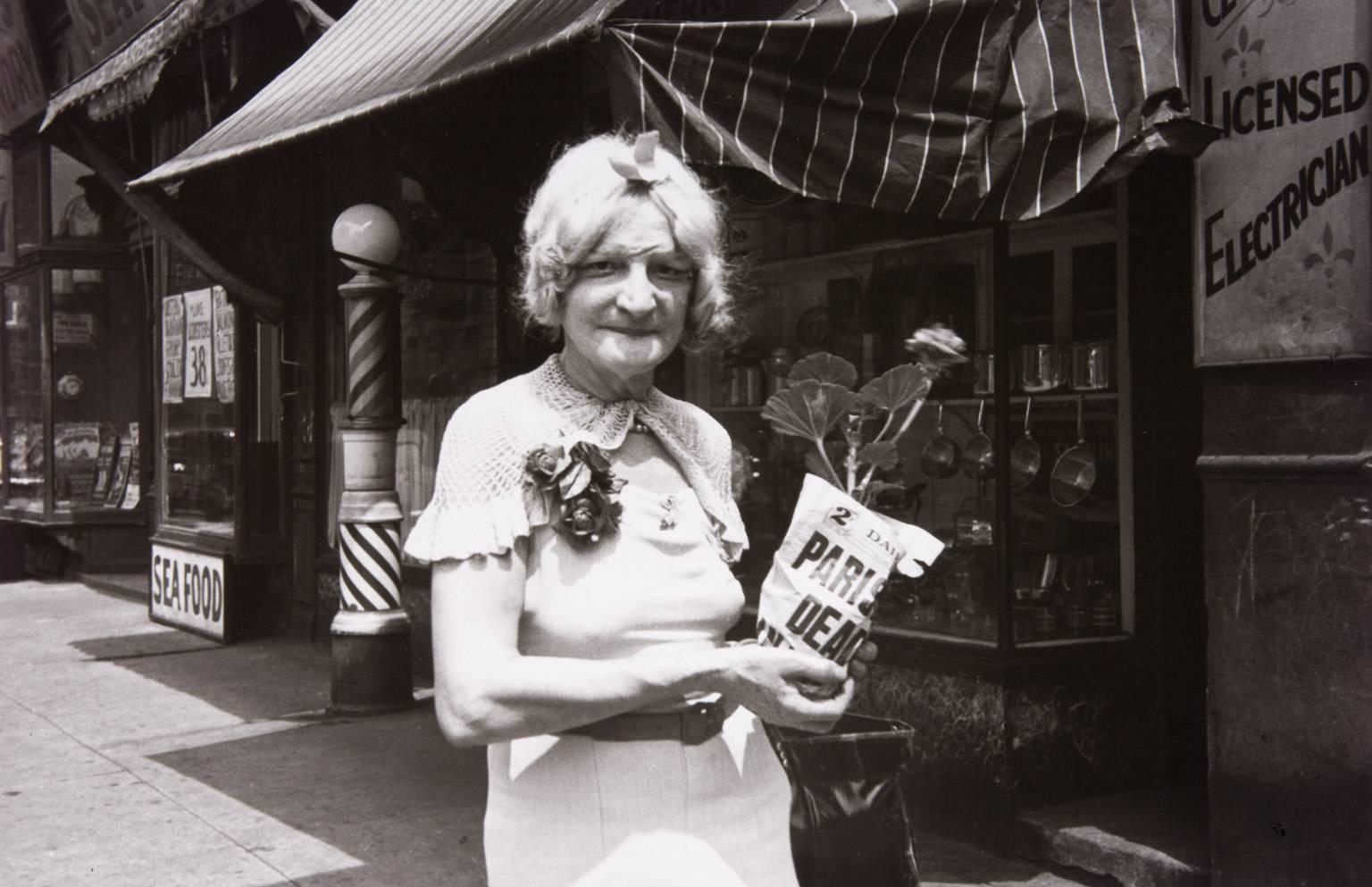 Helen Levitt Black and White Photograph - Woman with Flower